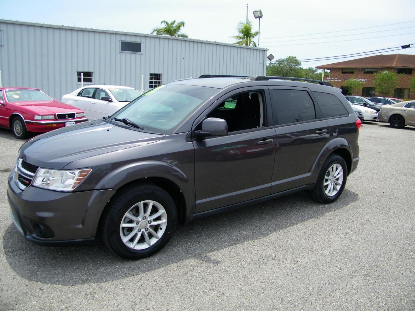 2015 Gray /Gray Dodge Journey SXT (3C4PDCBGXFT) with an 3.6L V6 DOHC 24V engine, 6-Speed Automatic transmission, located at 4000 Bee Ridge Road, Sarasota, FL, 34233, (941) 926-0300, 27.298664, -82.489151 - Photo#0