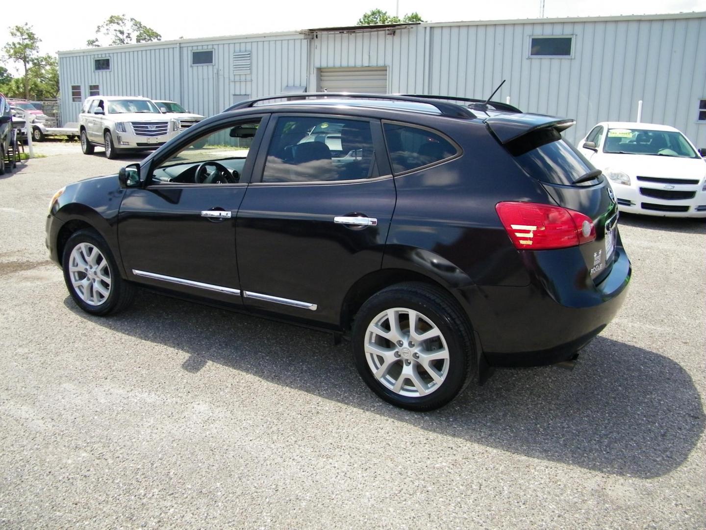 2011 Black /Grey Nissan Rogue SL 2WD (JN8AS5MT7BW) with an 2.5L L4 DOHC 16V engine, Automatic transmission, located at 4000 Bee Ridge Road, Sarasota, FL, 34233, (941) 926-0300, 27.298664, -82.489151 - Photo#3
