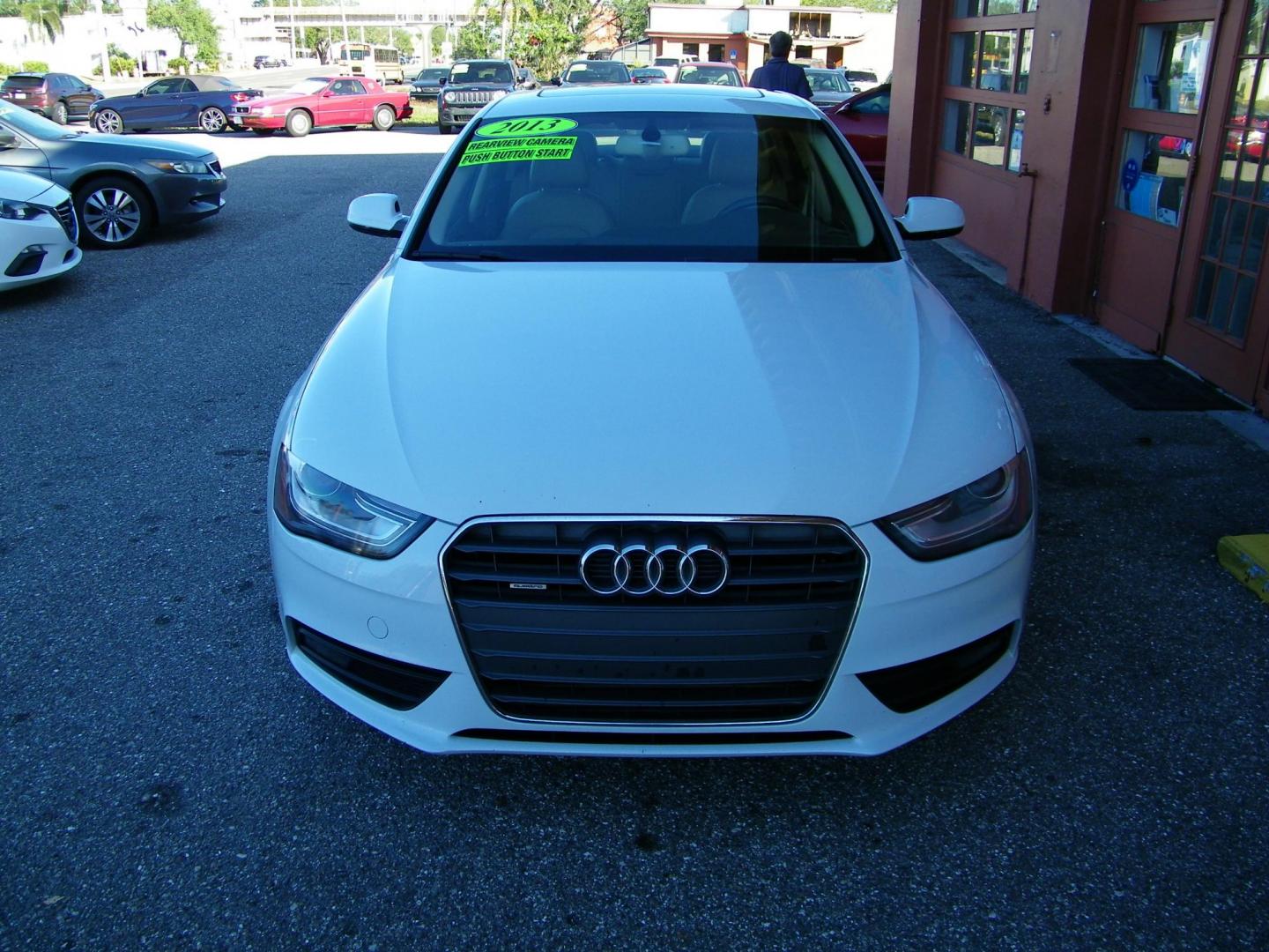 2013 White /Beige Audi A4 2.0T Premium Sedan quattro (WAUKFAFL9DA) with an 2.0L L4 DOHC 16V TURBO engine, AUTOMATIC transmission, located at 4000 Bee Ridge Road, Sarasota, FL, 34233, (941) 926-0300, 27.298664, -82.489151 - Photo#2