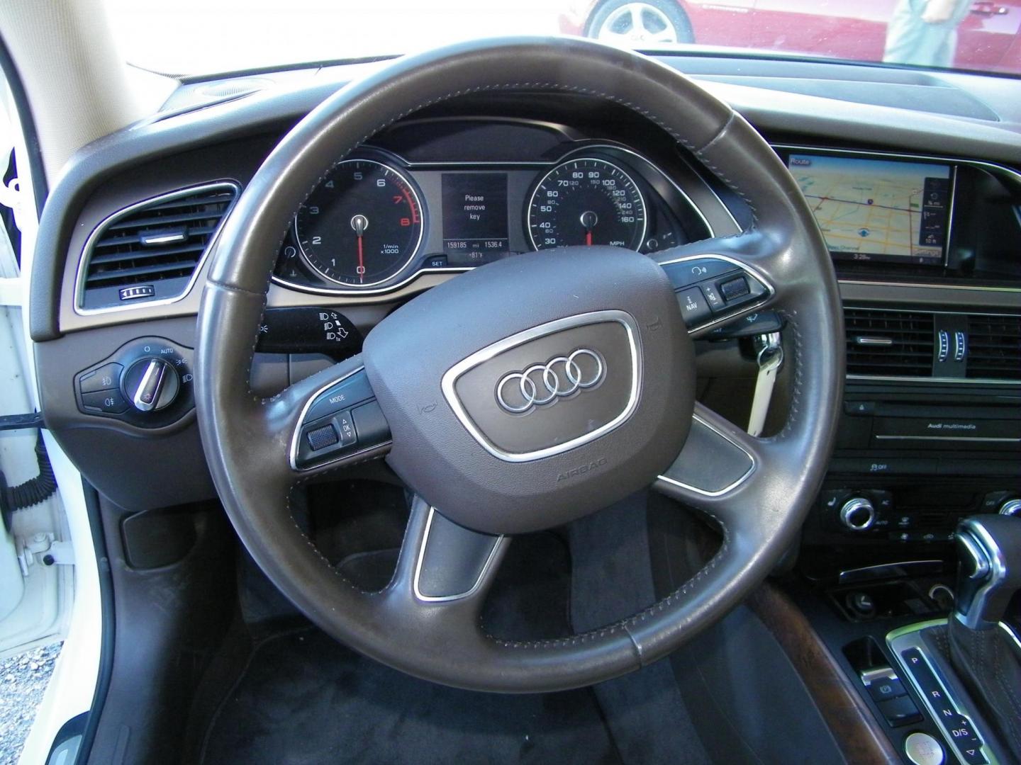 2013 White /Beige Audi A4 2.0T Premium Sedan quattro (WAUKFAFL9DA) with an 2.0L L4 DOHC 16V TURBO engine, AUTOMATIC transmission, located at 4000 Bee Ridge Road, Sarasota, FL, 34233, (941) 926-0300, 27.298664, -82.489151 - Photo#21