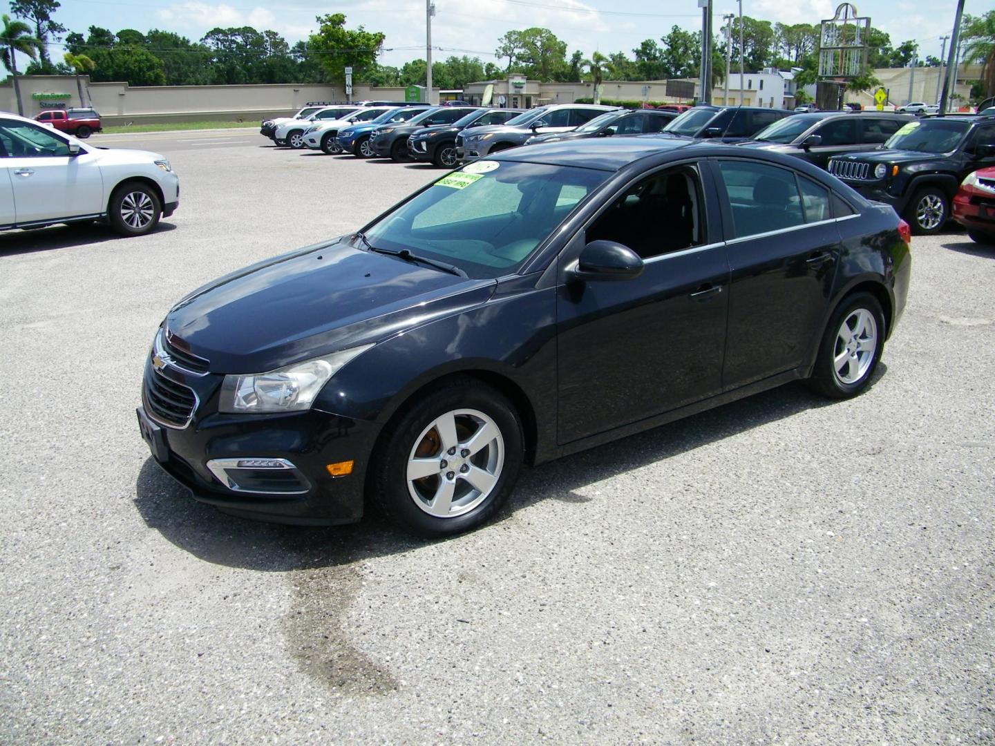 2015 Black /Black Chevrolet Cruze 1LT Auto (1G1PC5SB7F7) with an 1.4L L4 DOHC 16V TURBO engine, 6-Speed Automatic transmission, located at 4000 Bee Ridge Road, Sarasota, FL, 34233, (941) 926-0300, 27.298664, -82.489151 - Photo#0