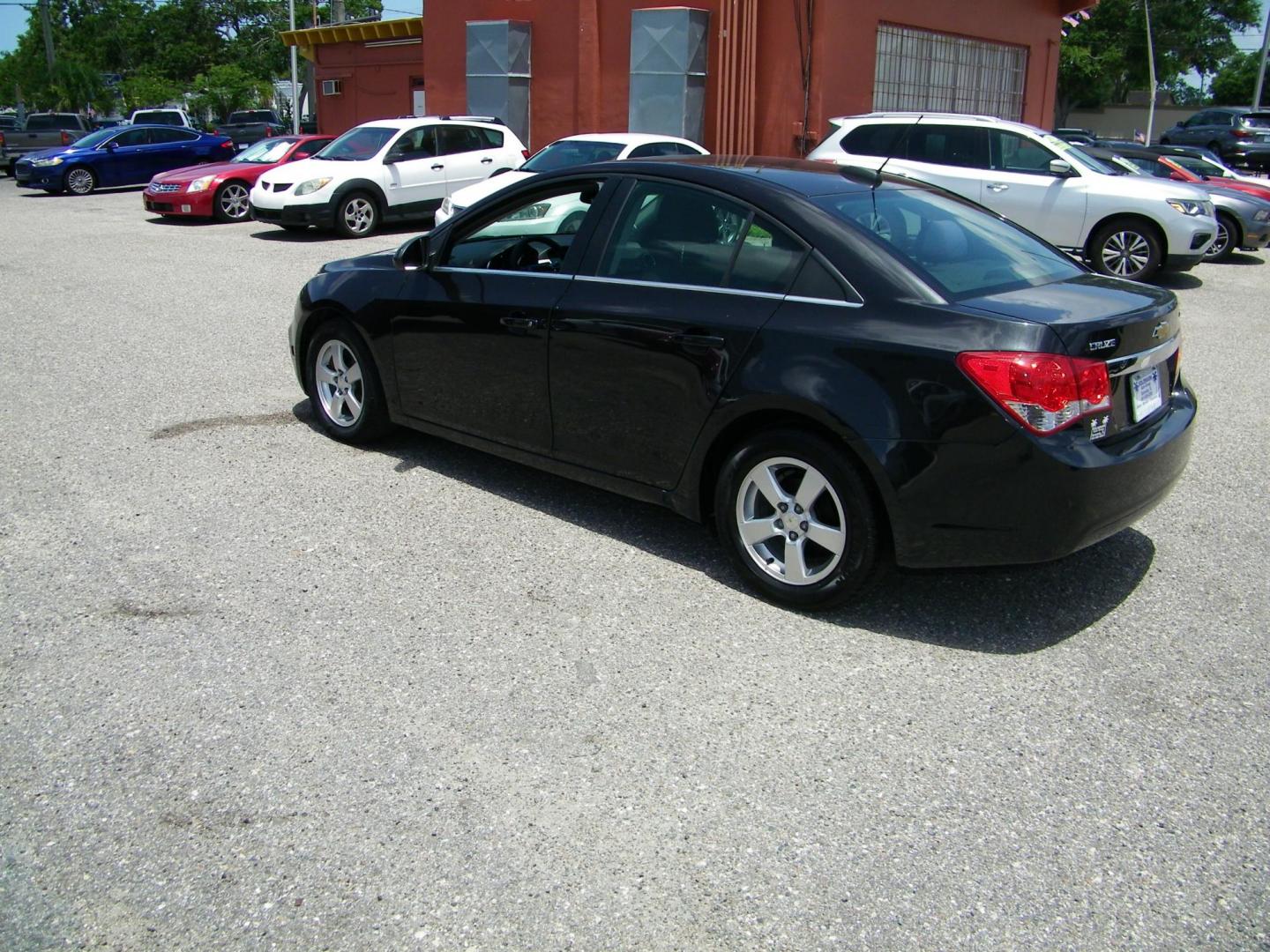 2015 Black /Black Chevrolet Cruze 1LT Auto (1G1PC5SB7F7) with an 1.4L L4 DOHC 16V TURBO engine, 6-Speed Automatic transmission, located at 4000 Bee Ridge Road, Sarasota, FL, 34233, (941) 926-0300, 27.298664, -82.489151 - Photo#3