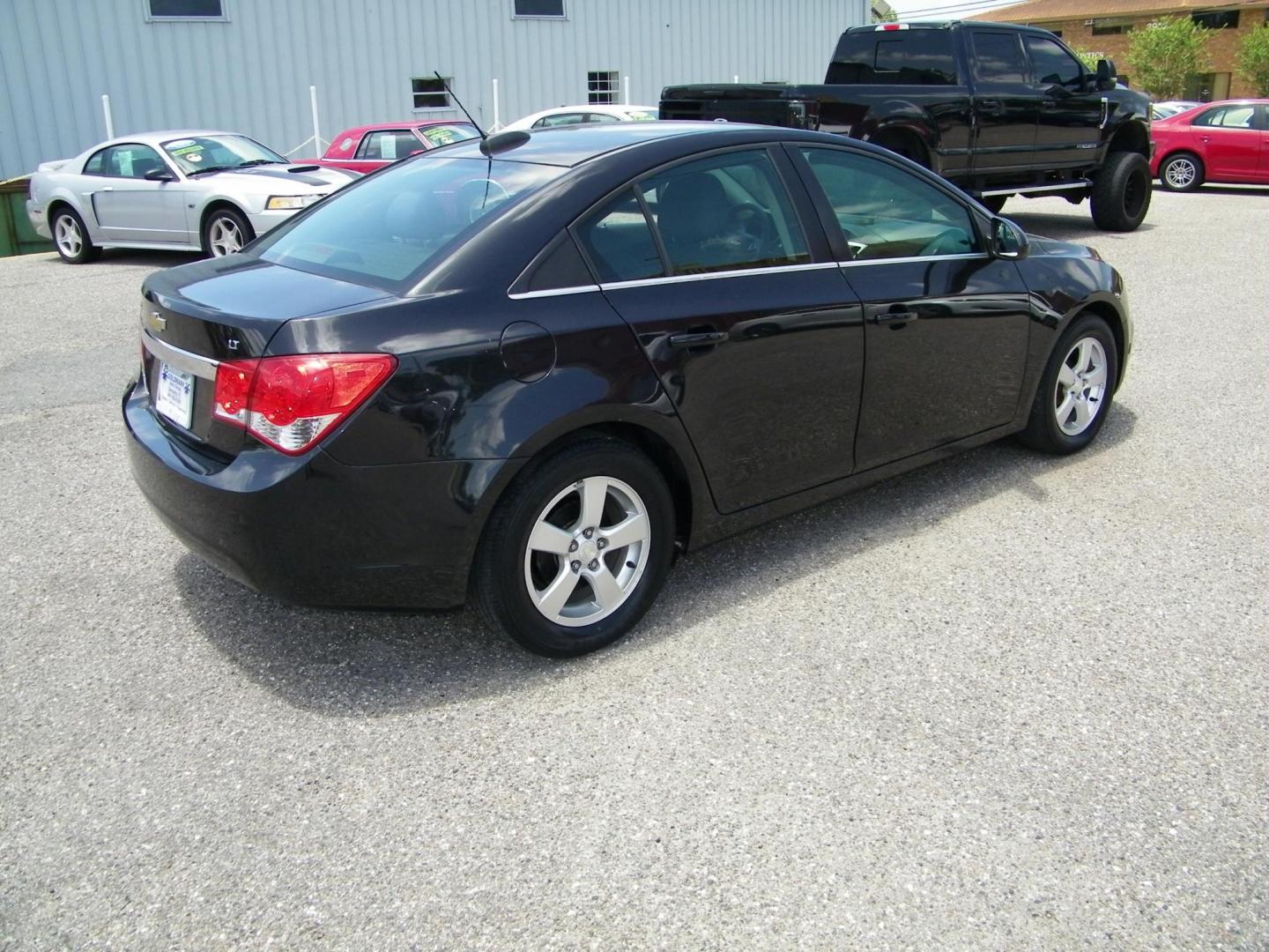 2015 Black /Black Chevrolet Cruze 1LT Auto (1G1PC5SB7F7) with an 1.4L L4 DOHC 16V TURBO engine, 6-Speed Automatic transmission, located at 4000 Bee Ridge Road, Sarasota, FL, 34233, (941) 926-0300, 27.298664, -82.489151 - Photo#5