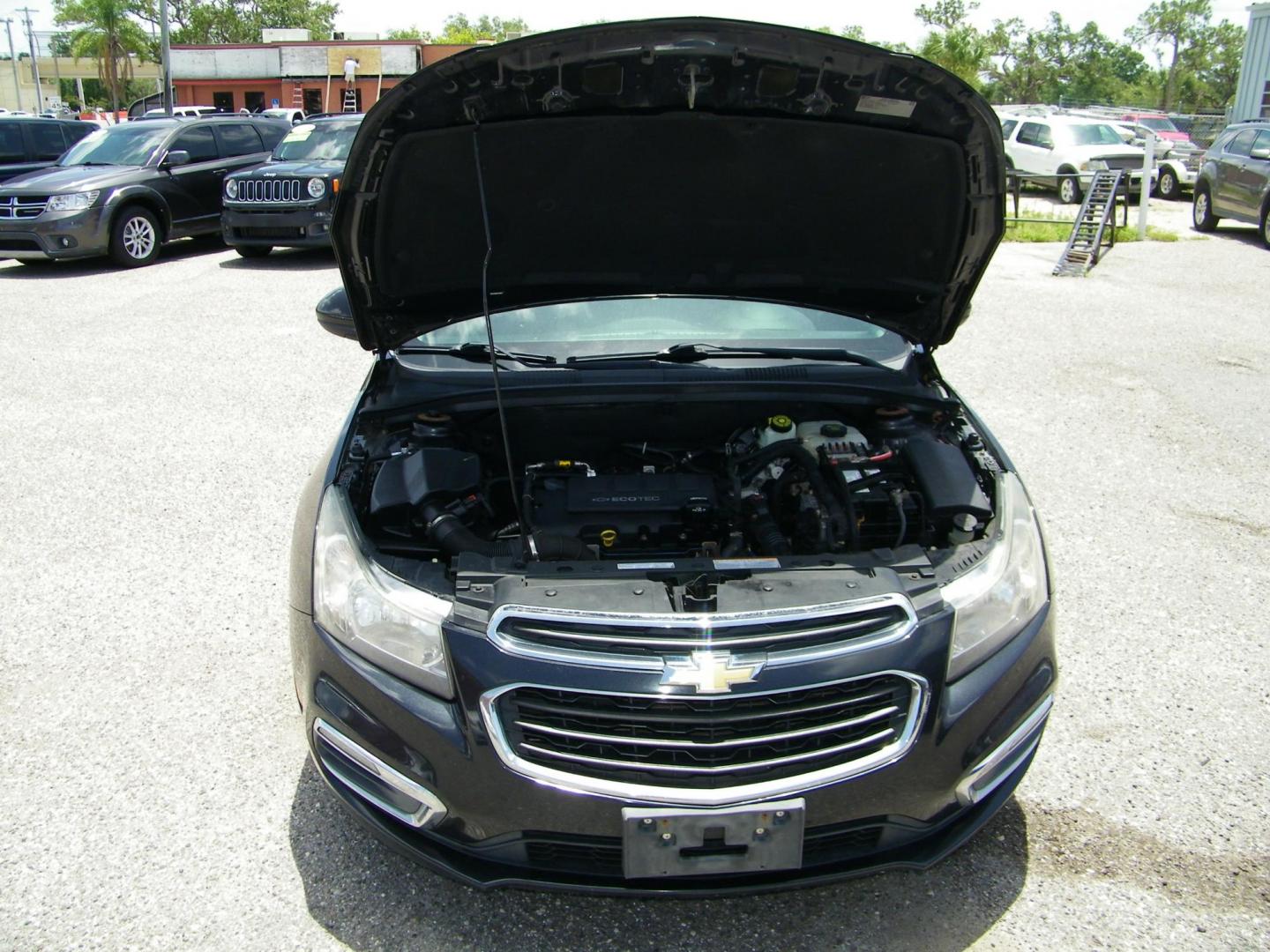 2015 Black /Black Chevrolet Cruze 1LT Auto (1G1PC5SB7F7) with an 1.4L L4 DOHC 16V TURBO engine, 6-Speed Automatic transmission, located at 4000 Bee Ridge Road, Sarasota, FL, 34233, (941) 926-0300, 27.298664, -82.489151 - Photo#8