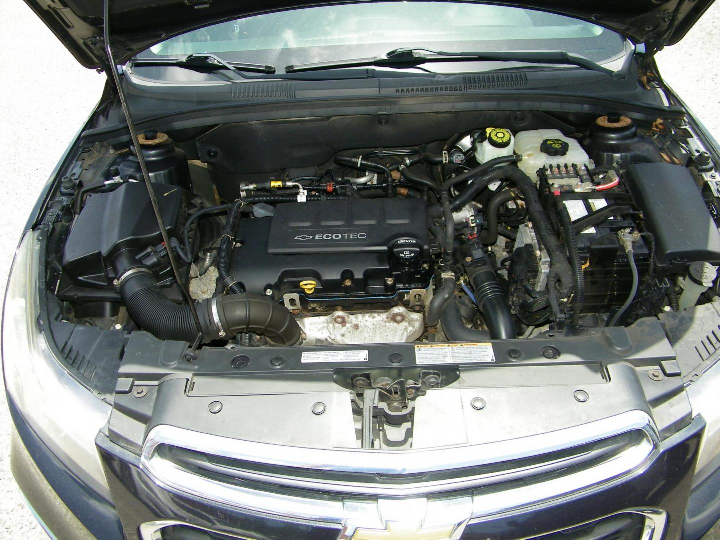 2015 Black /Black Chevrolet Cruze 1LT Auto (1G1PC5SB7F7) with an 1.4L L4 DOHC 16V TURBO engine, 6-Speed Automatic transmission, located at 4000 Bee Ridge Road, Sarasota, FL, 34233, (941) 926-0300, 27.298664, -82.489151 - Photo#9