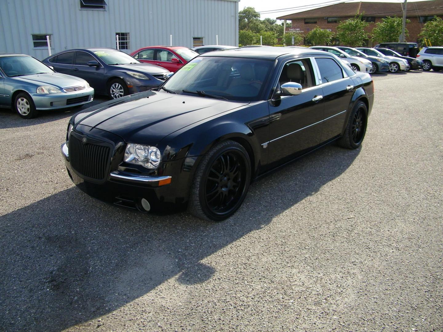 2006 Black /Black Chrysler 300 C (2C3KA63H46H) with an 5.7L V8 HEMI engine, Automatic transmission, located at 4000 Bee Ridge Road, Sarasota, FL, 34233, (941) 926-0300, 27.298664, -82.489151 - Photo#1