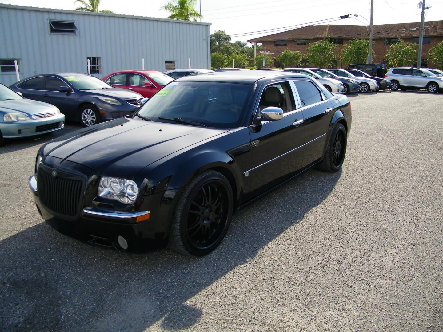 2006 Black /Black Chrysler 300 C (2C3KA63H46H) with an 5.7L V8 HEMI engine, Automatic transmission, located at 4000 Bee Ridge Road, Sarasota, FL, 34233, (941) 926-0300, 27.298664, -82.489151 - Photo#0