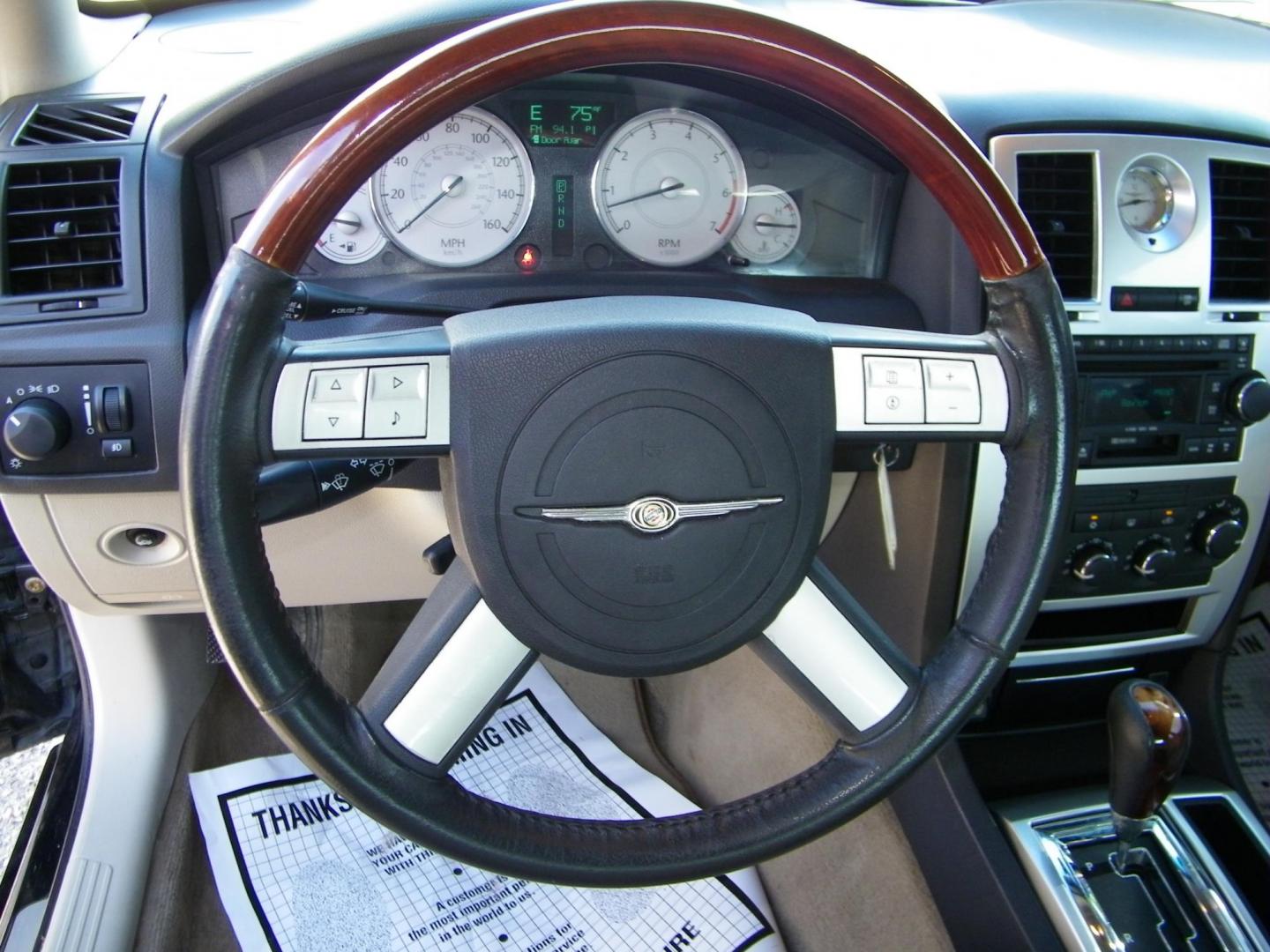 2006 Black /Black Chrysler 300 C (2C3KA63H46H) with an 5.7L V8 HEMI engine, Automatic transmission, located at 4000 Bee Ridge Road, Sarasota, FL, 34233, (941) 926-0300, 27.298664, -82.489151 - Photo#24