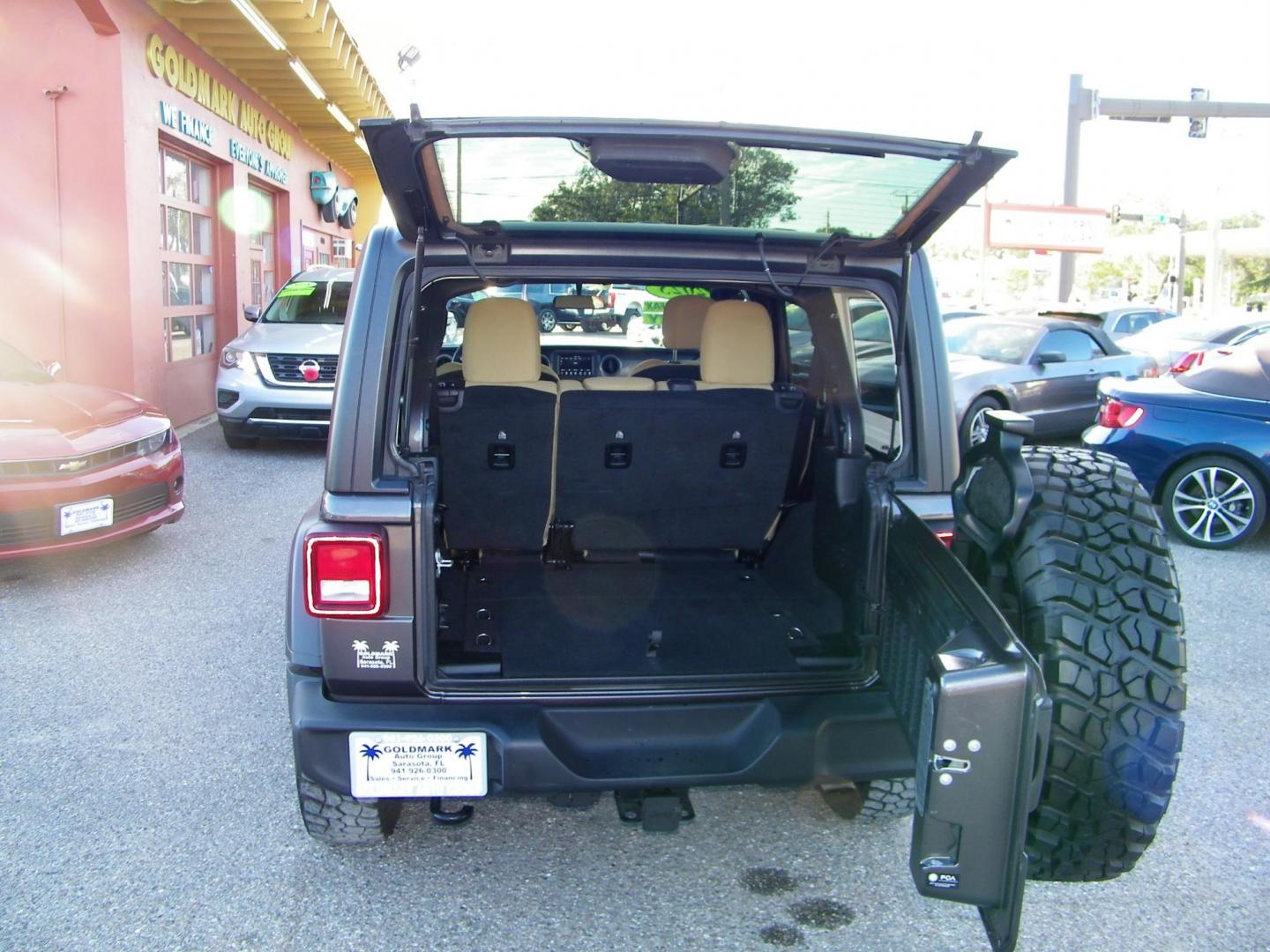 2023 Gray /Tan Jeep Wrangler Unlimited Sport (1C4HJXDG9PW) with an 3.6L V6 DOHC 24V FFV engine, 6A transmission, located at 4000 Bee Ridge Road, Sarasota, FL, 34233, (941) 926-0300, 27.298664, -82.489151 - Photo#12