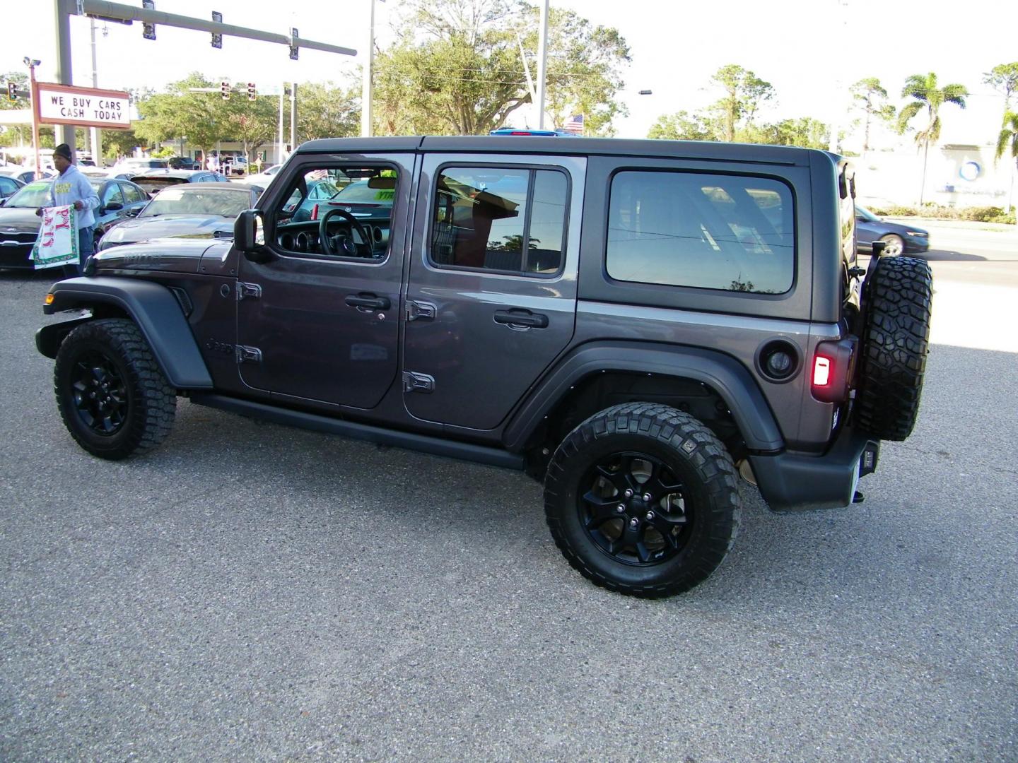 2023 Gray /Tan Jeep Wrangler Unlimited Sport (1C4HJXDG9PW) with an 3.6L V6 DOHC 24V FFV engine, 6A transmission, located at 4000 Bee Ridge Road, Sarasota, FL, 34233, (941) 926-0300, 27.298664, -82.489151 - Photo#3
