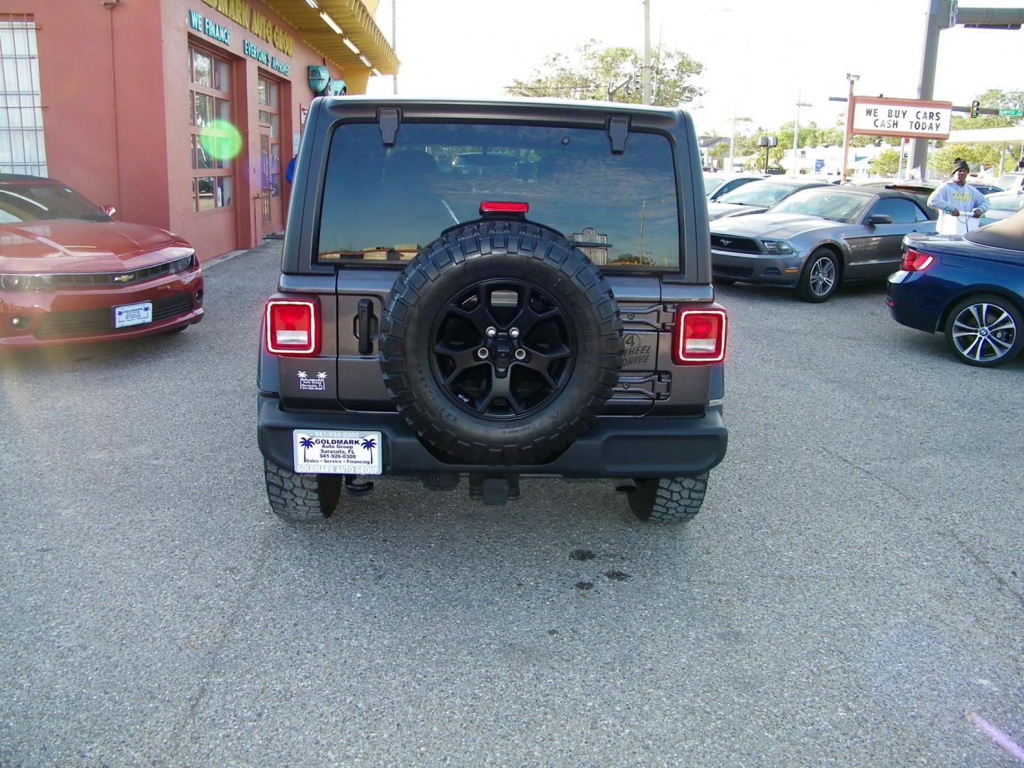 2023 Gray /Tan Jeep Wrangler Unlimited Sport (1C4HJXDG9PW) with an 3.6L V6 DOHC 24V FFV engine, 6A transmission, located at 4000 Bee Ridge Road, Sarasota, FL, 34233, (941) 926-0300, 27.298664, -82.489151 - Photo#5