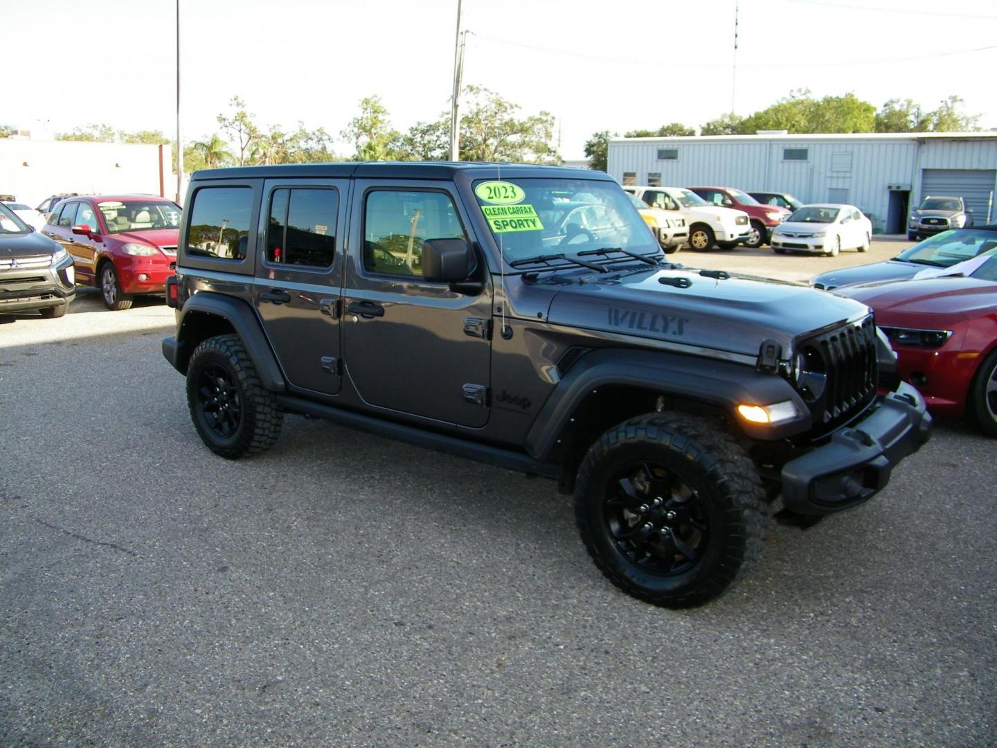 2023 Gray /Tan Jeep Wrangler Unlimited Sport (1C4HJXDG9PW) with an 3.6L V6 DOHC 24V FFV engine, 6A transmission, located at 4000 Bee Ridge Road, Sarasota, FL, 34233, (941) 926-0300, 27.298664, -82.489151 - Photo#7