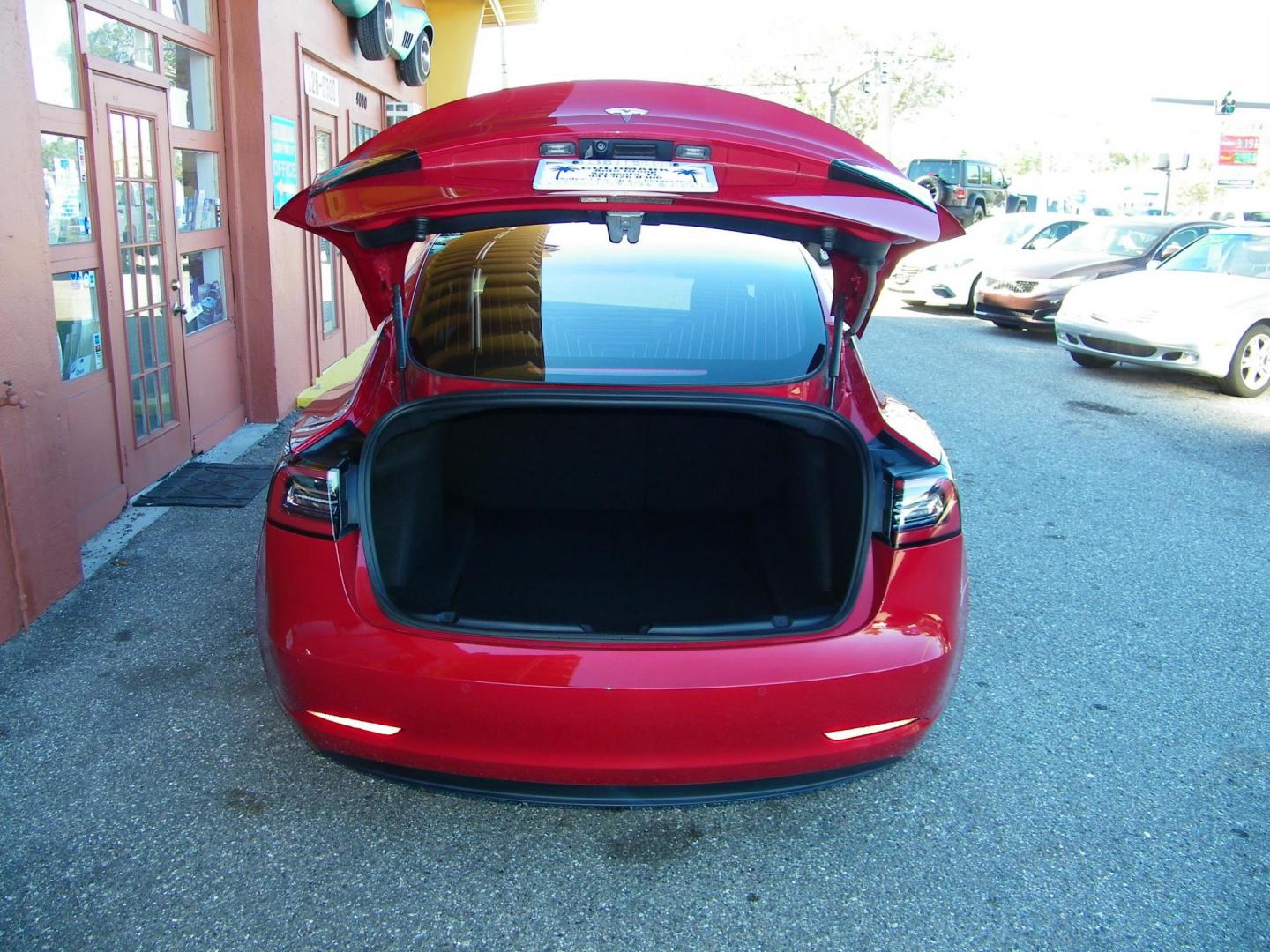 2018 Red /Black Tesla Model 3 Base (5YJ3E1EA1JF) with an ELECTRIC engine, 1A transmission, located at 4000 Bee Ridge Road, Sarasota, FL, 34233, (941) 926-0300, 27.298664, -82.489151 - Photo#13