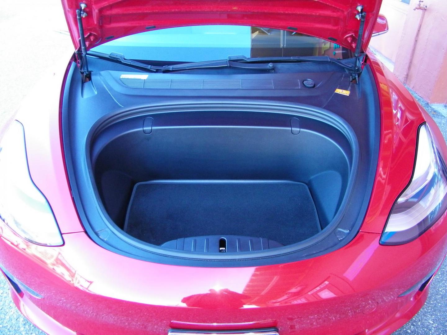 2018 Red /Black Tesla Model 3 Base (5YJ3E1EA1JF) with an ELECTRIC engine, 1A transmission, located at 4000 Bee Ridge Road, Sarasota, FL, 34233, (941) 926-0300, 27.298664, -82.489151 - Photo#2