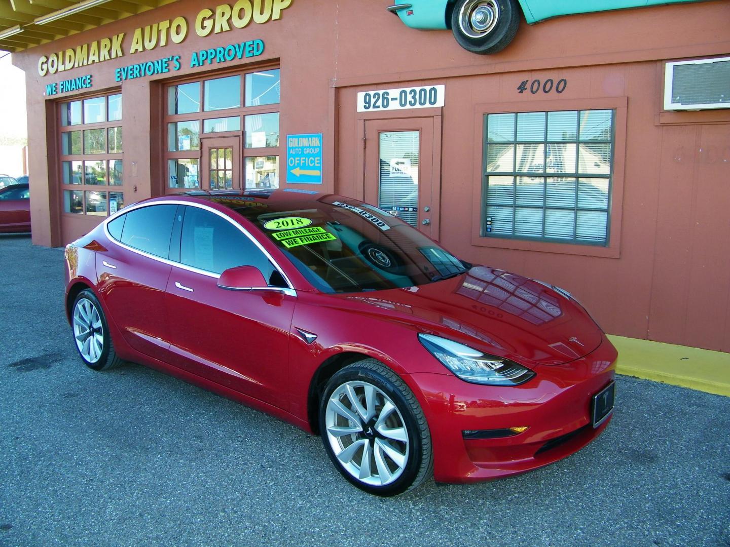 2018 Red /Black Tesla Model 3 Base (5YJ3E1EA1JF) with an ELECTRIC engine, 1A transmission, located at 4000 Bee Ridge Road, Sarasota, FL, 34233, (941) 926-0300, 27.298664, -82.489151 - Photo#3