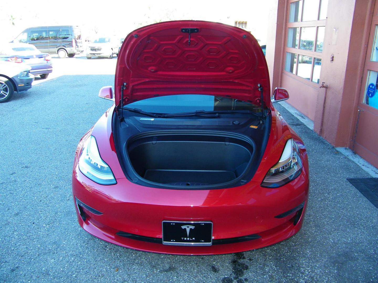 2018 Red /Black Tesla Model 3 Base (5YJ3E1EA1JF) with an ELECTRIC engine, 1A transmission, located at 4000 Bee Ridge Road, Sarasota, FL, 34233, (941) 926-0300, 27.298664, -82.489151 - Photo#4