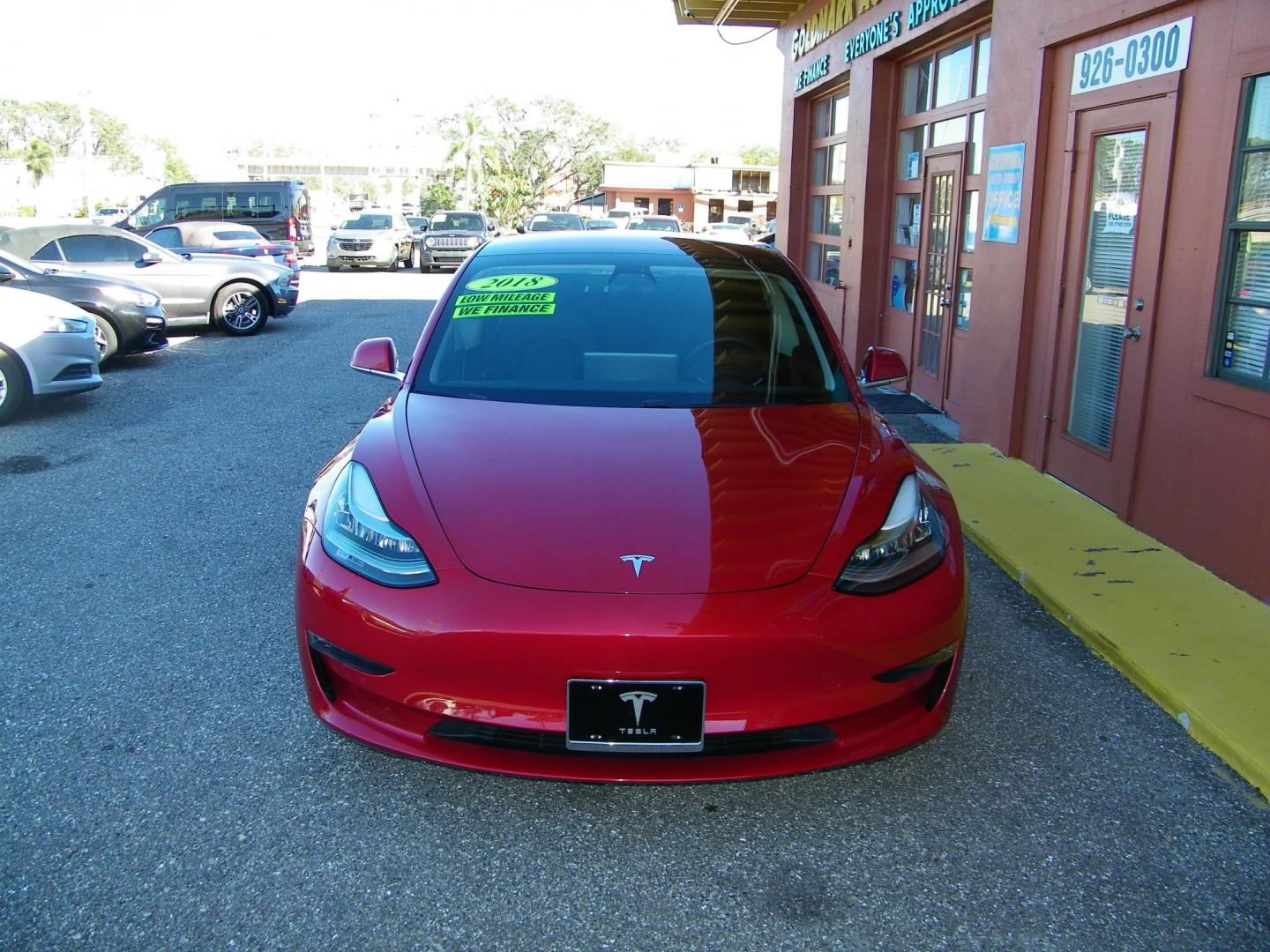 2018 Red /Black Tesla Model 3 Base (5YJ3E1EA1JF) with an ELECTRIC engine, 1A transmission, located at 4000 Bee Ridge Road, Sarasota, FL, 34233, (941) 926-0300, 27.298664, -82.489151 - Photo#5