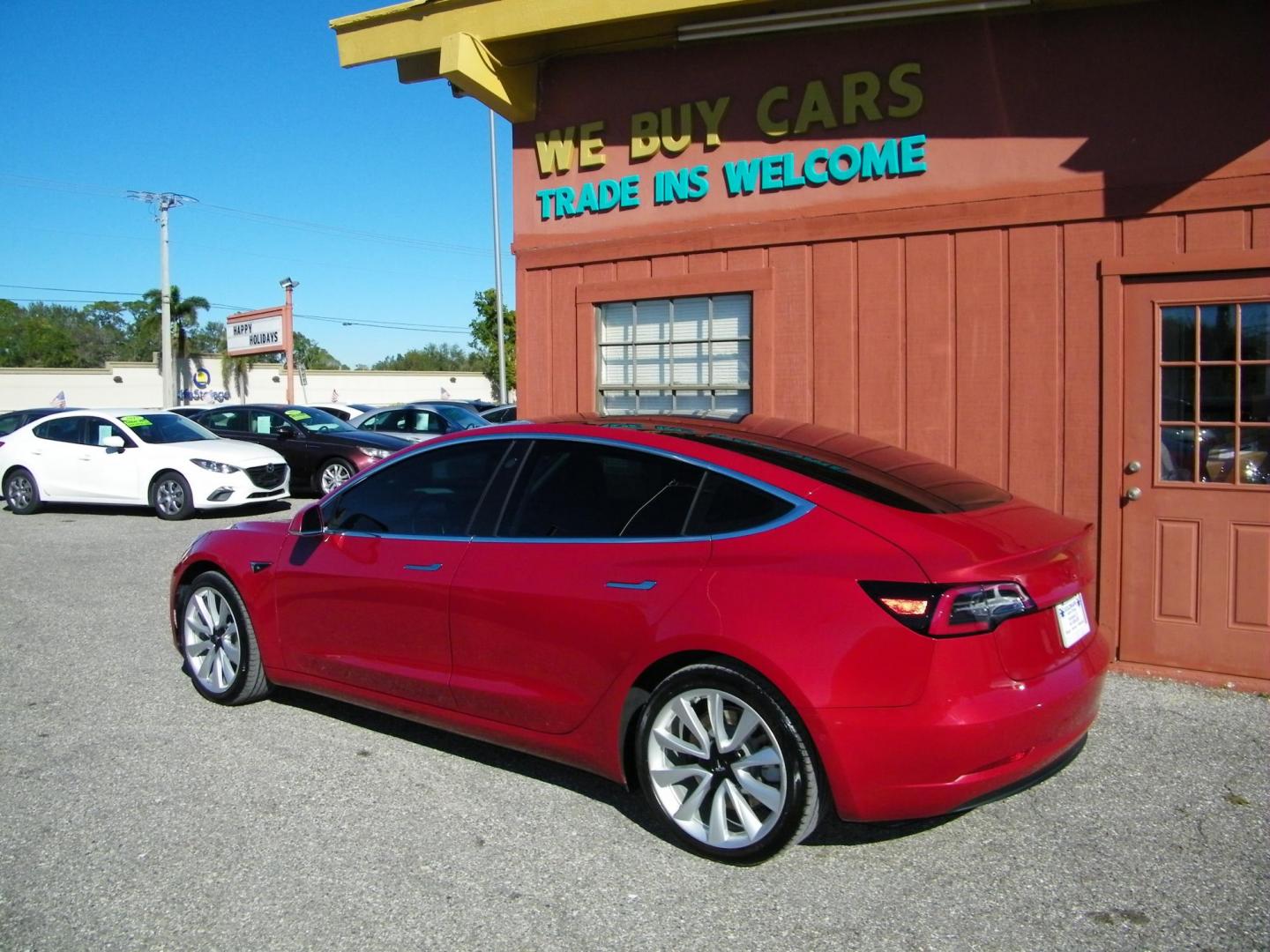2018 Red /Black Tesla Model 3 Base (5YJ3E1EA1JF) with an ELECTRIC engine, 1A transmission, located at 4000 Bee Ridge Road, Sarasota, FL, 34233, (941) 926-0300, 27.298664, -82.489151 - Photo#7