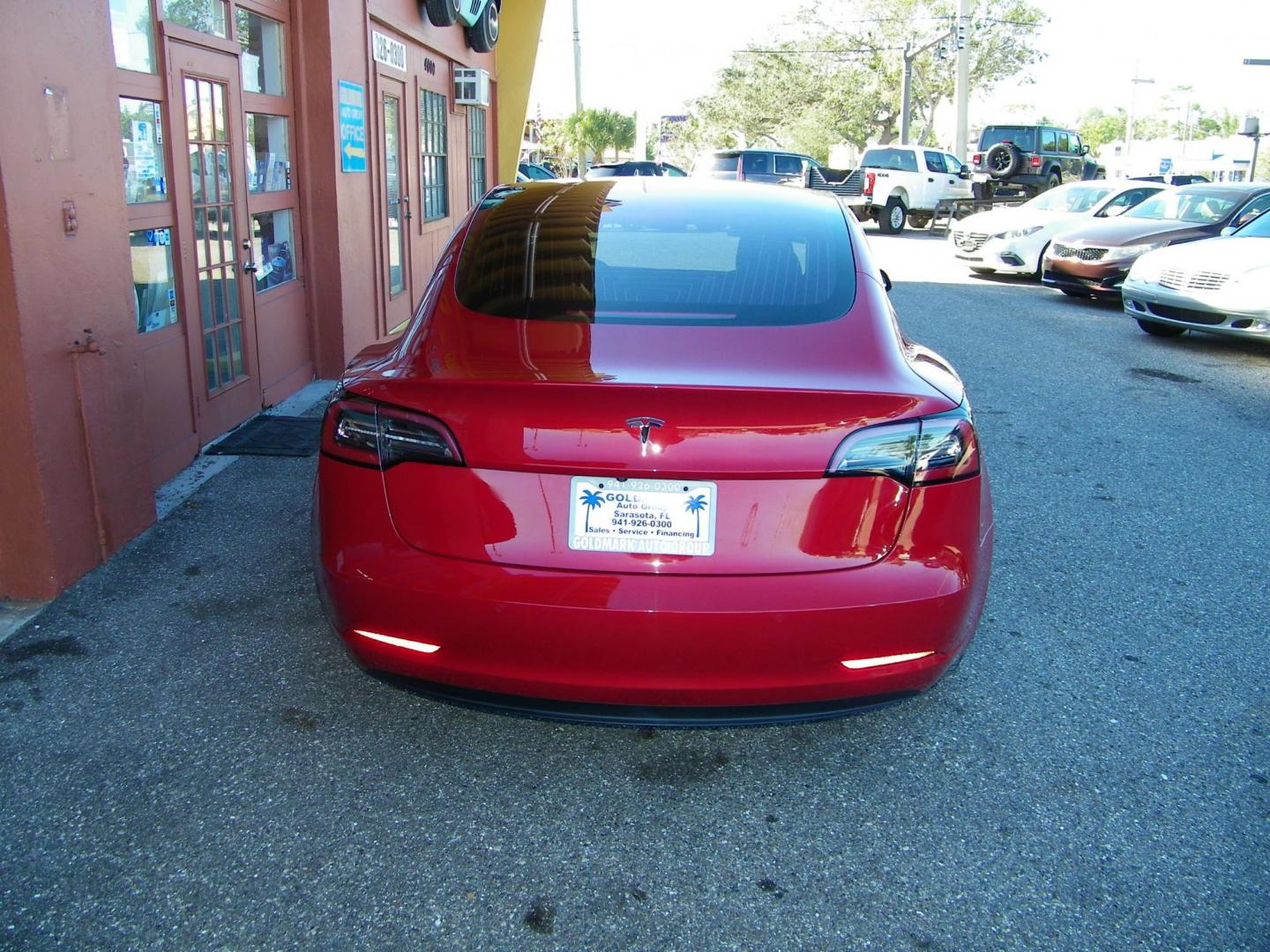 2018 Red /Black Tesla Model 3 Base (5YJ3E1EA1JF) with an ELECTRIC engine, 1A transmission, located at 4000 Bee Ridge Road, Sarasota, FL, 34233, (941) 926-0300, 27.298664, -82.489151 - Photo#9