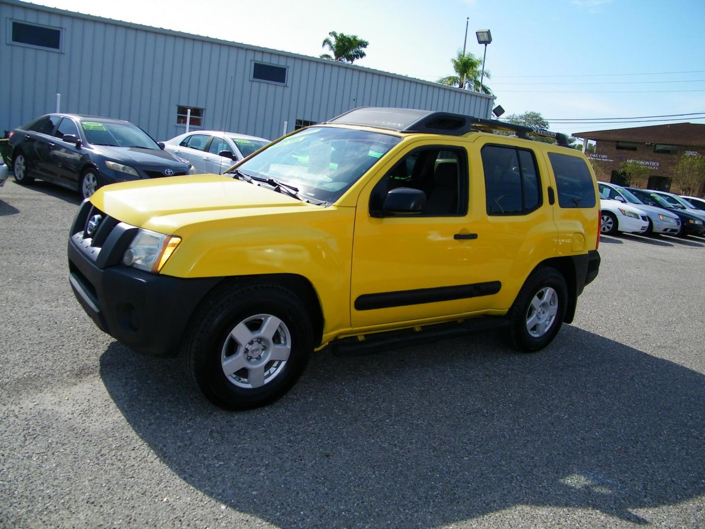 2005 Yellow /Gray Nissan Xterra 2WD (5N1AN08U85C) with an 4.0L V6 DOHC 24V engine, Automatic transmission, located at 4000 Bee Ridge Road, Sarasota, FL, 34233, (941) 926-0300, 27.298664, -82.489151 - Photo#2
