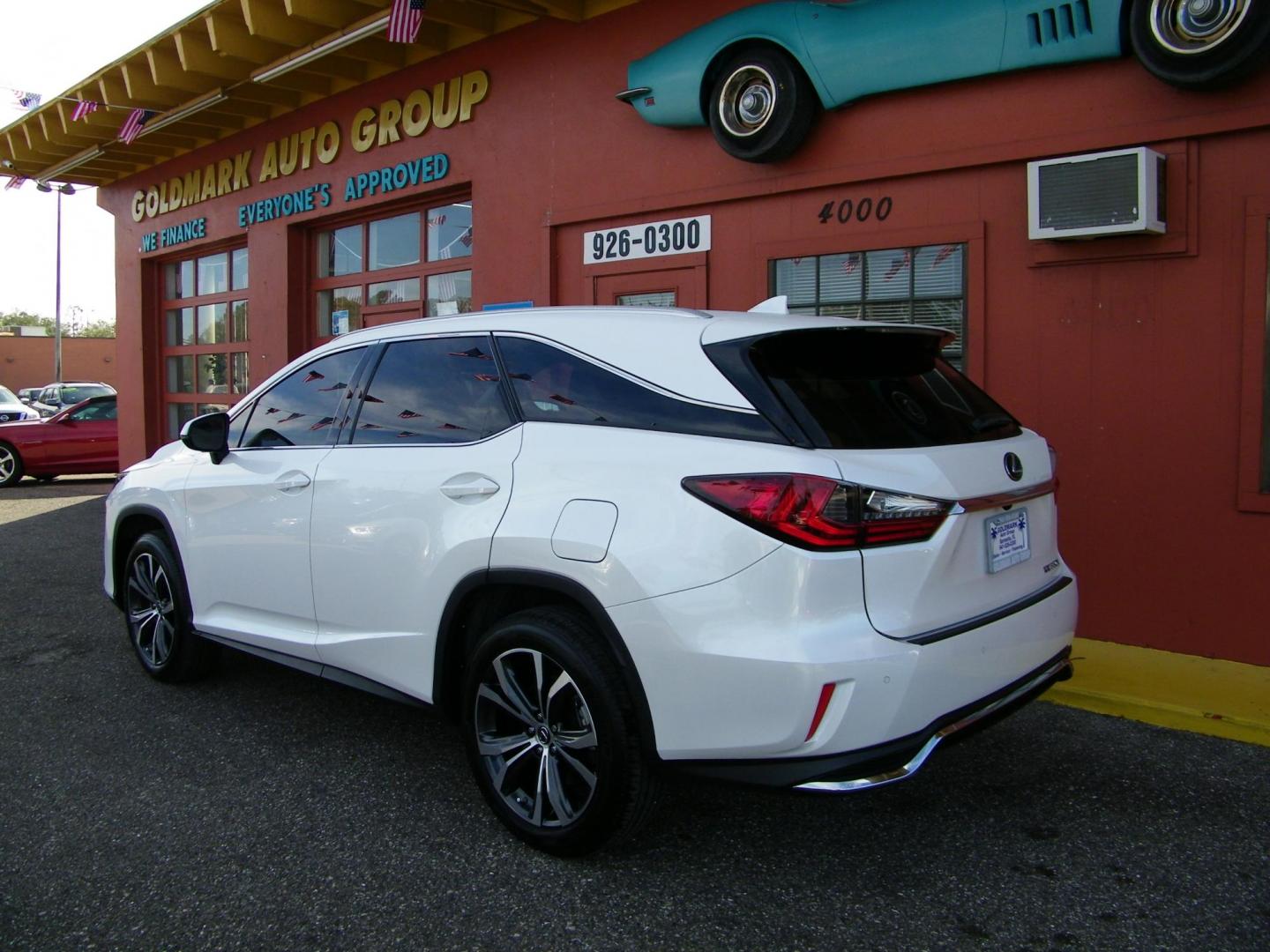 2022 White /Beige Lexus RX 350L FWD (JTJHZKEA5N2) with an 3.5L V6 DOHC 24V engine, 6A transmission, located at 4000 Bee Ridge Road, Sarasota, FL, 34233, (941) 926-0300, 27.298664, -82.489151 - Photo#3