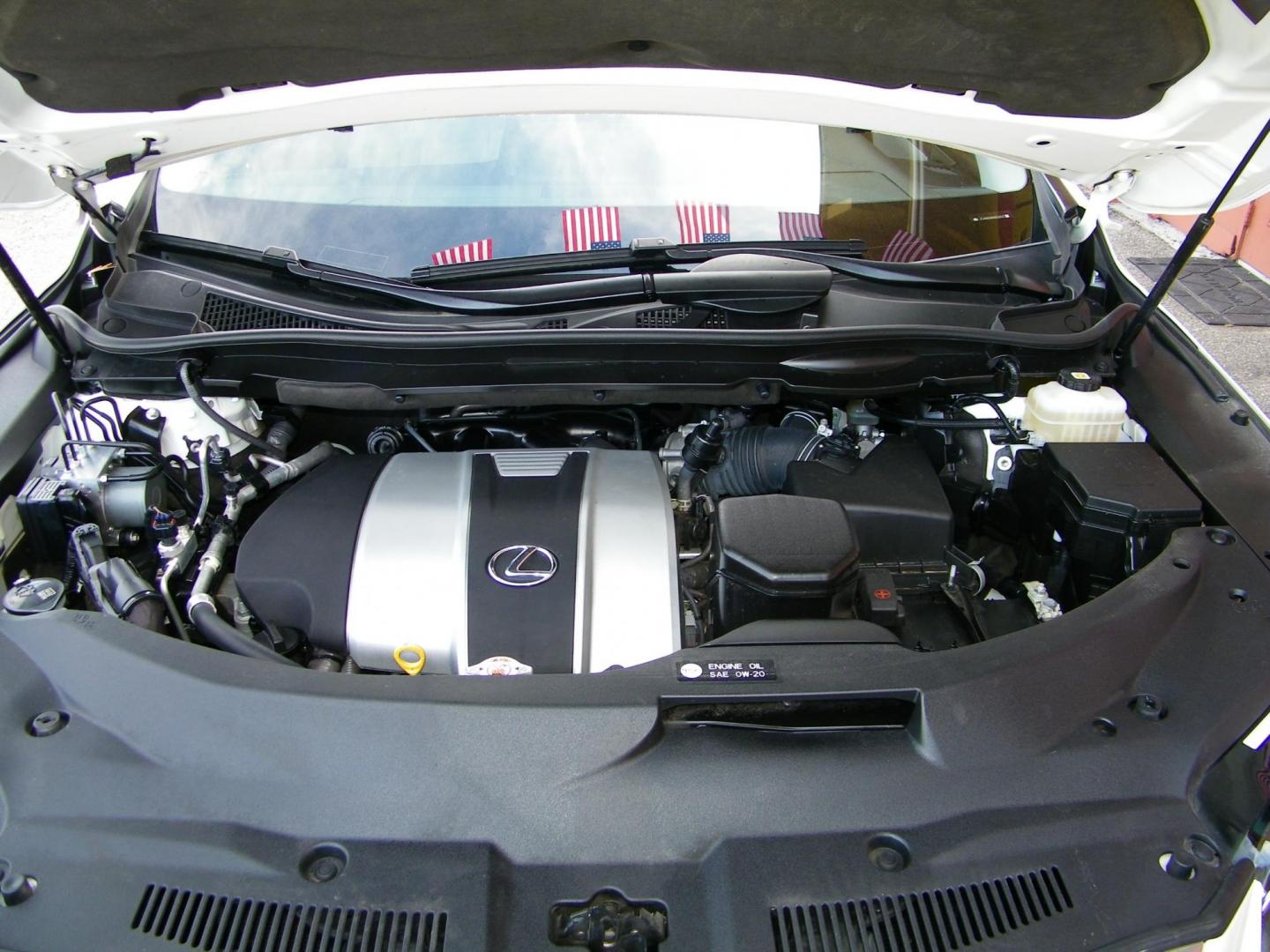 2022 White /Beige Lexus RX 350L FWD (JTJHZKEA5N2) with an 3.5L V6 DOHC 24V engine, 6A transmission, located at 4000 Bee Ridge Road, Sarasota, FL, 34233, (941) 926-0300, 27.298664, -82.489151 - Photo#17