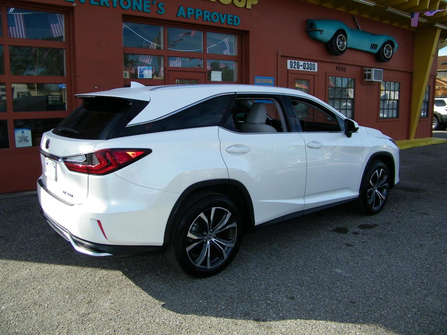 2022 White /Beige Lexus RX 350L FWD (JTJHZKEA5N2) with an 3.5L V6 DOHC 24V engine, 6A transmission, located at 4000 Bee Ridge Road, Sarasota, FL, 34233, (941) 926-0300, 27.298664, -82.489151 - Photo#5