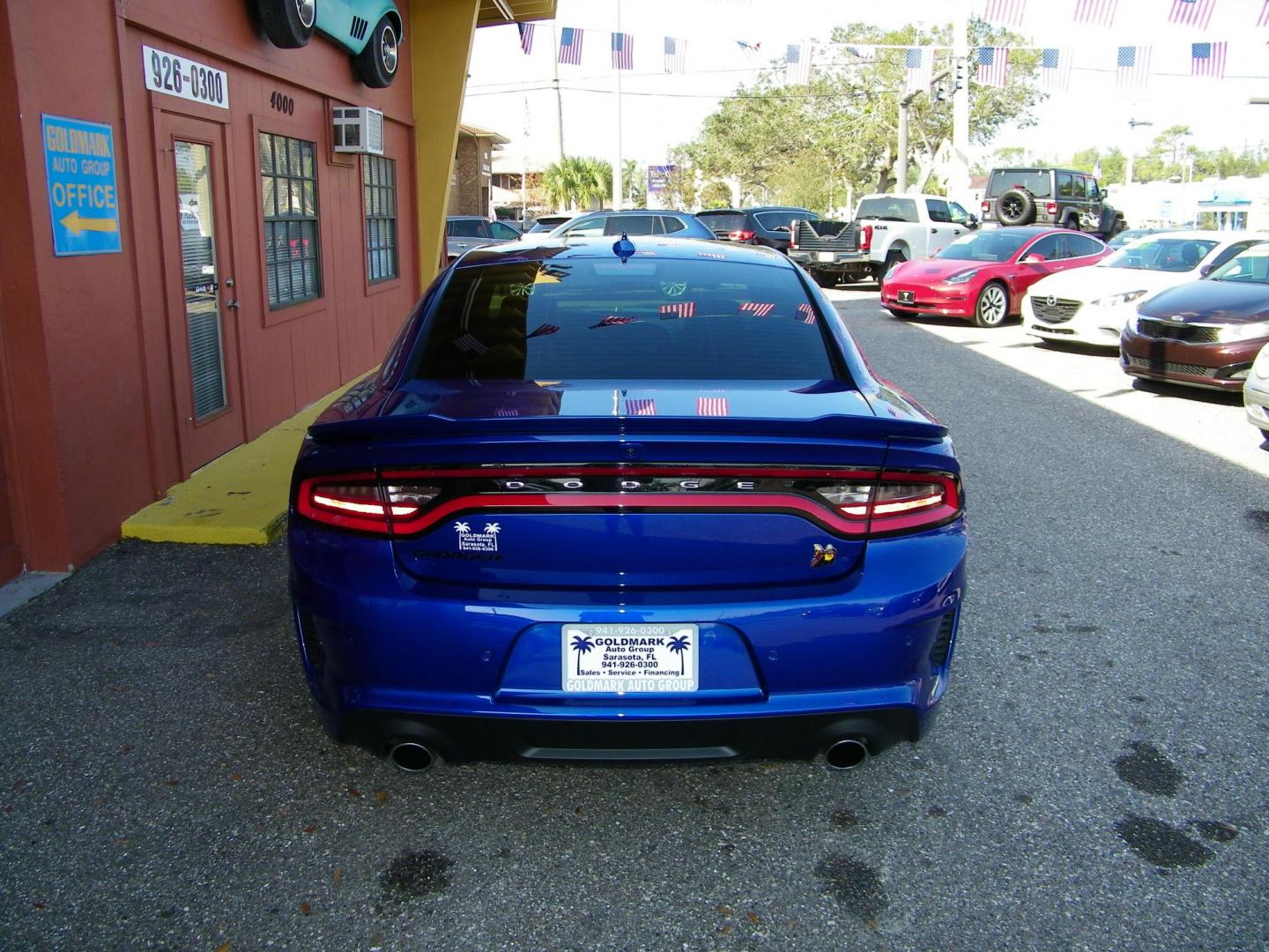 2020 Blue /Black Dodge Charger Scat Pack (2C3CDXGJ6LH) with an 6.4L V8 OHV 16V engine, 5A transmission, located at 4000 Bee Ridge Road, Sarasota, FL, 34233, (941) 926-0300, 27.298664, -82.489151 - Photo#2