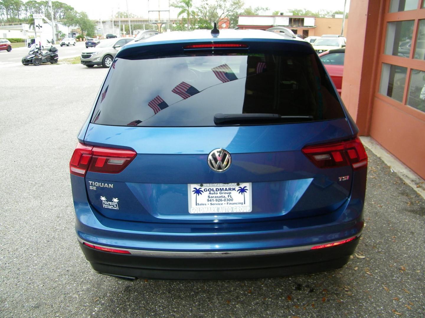 2018 Blue /Black Volkswagen Tiguan SE (3VV3B7AX7JM) with an 2.0L L4 DOHC 16V TURBO engine, 8A transmission, located at 4000 Bee Ridge Road, Sarasota, FL, 34233, (941) 926-0300, 27.298664, -82.489151 - Photo#3