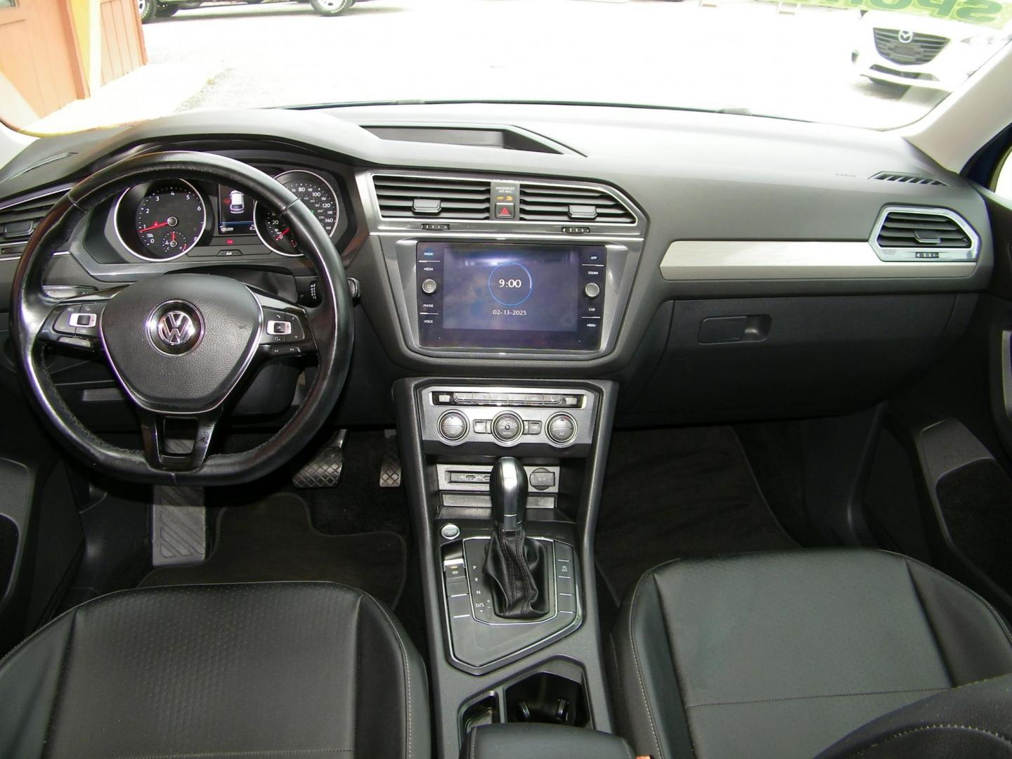 2018 Blue /Black Volkswagen Tiguan SE (3VV3B7AX7JM) with an 2.0L L4 DOHC 16V TURBO engine, 8A transmission, located at 4000 Bee Ridge Road, Sarasota, FL, 34233, (941) 926-0300, 27.298664, -82.489151 - Photo#11