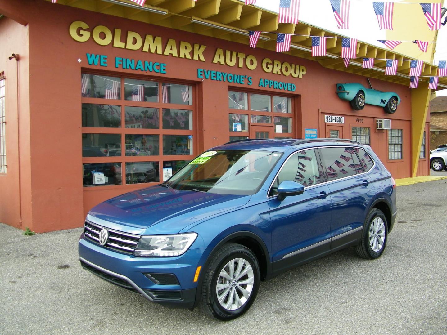 2018 Blue /Black Volkswagen Tiguan SE (3VV3B7AX7JM) with an 2.0L L4 DOHC 16V TURBO engine, 8A transmission, located at 4000 Bee Ridge Road, Sarasota, FL, 34233, (941) 926-0300, 27.298664, -82.489151 - Photo#1