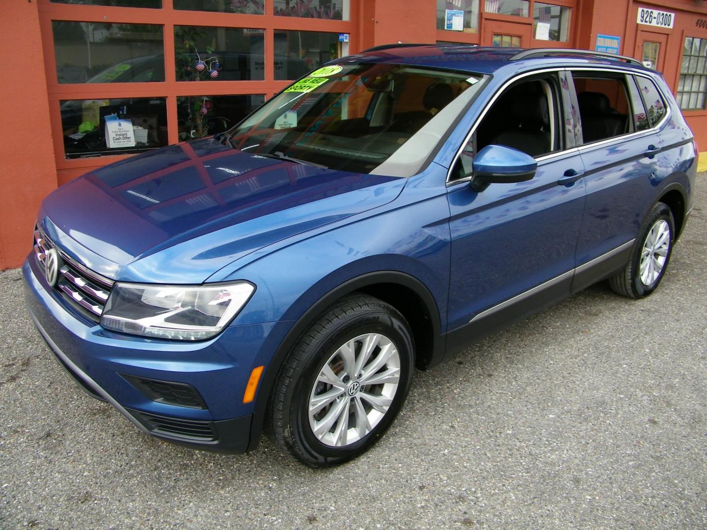 2018 Blue /Black Volkswagen Tiguan SE (3VV3B7AX7JM) with an 2.0L L4 DOHC 16V TURBO engine, 8A transmission, located at 4000 Bee Ridge Road, Sarasota, FL, 34233, (941) 926-0300, 27.298664, -82.489151 - Photo#0