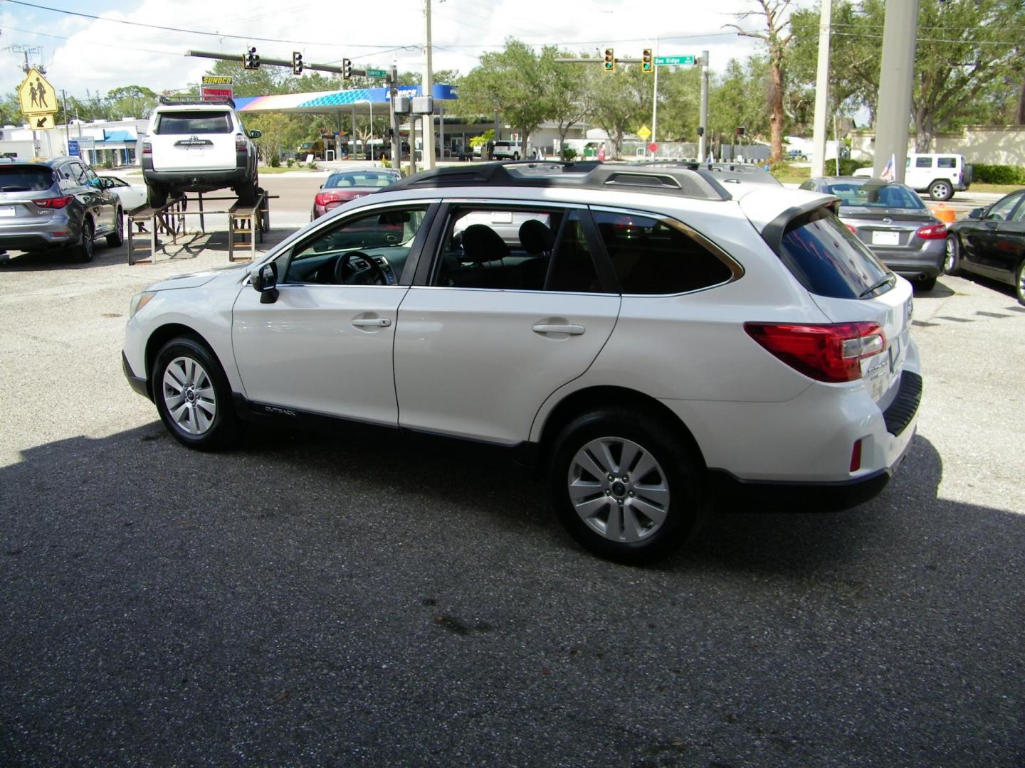 2015 White /Grey Subaru Outback 2.5i Premium (4S4BSBFC0F3) with an 2.5L H4 DOHC 16V engine, 6-Speed Automatic transmission, located at 4000 Bee Ridge Road, Sarasota, FL, 34233, (941) 926-0300, 27.298664, -82.489151 - Photo#2