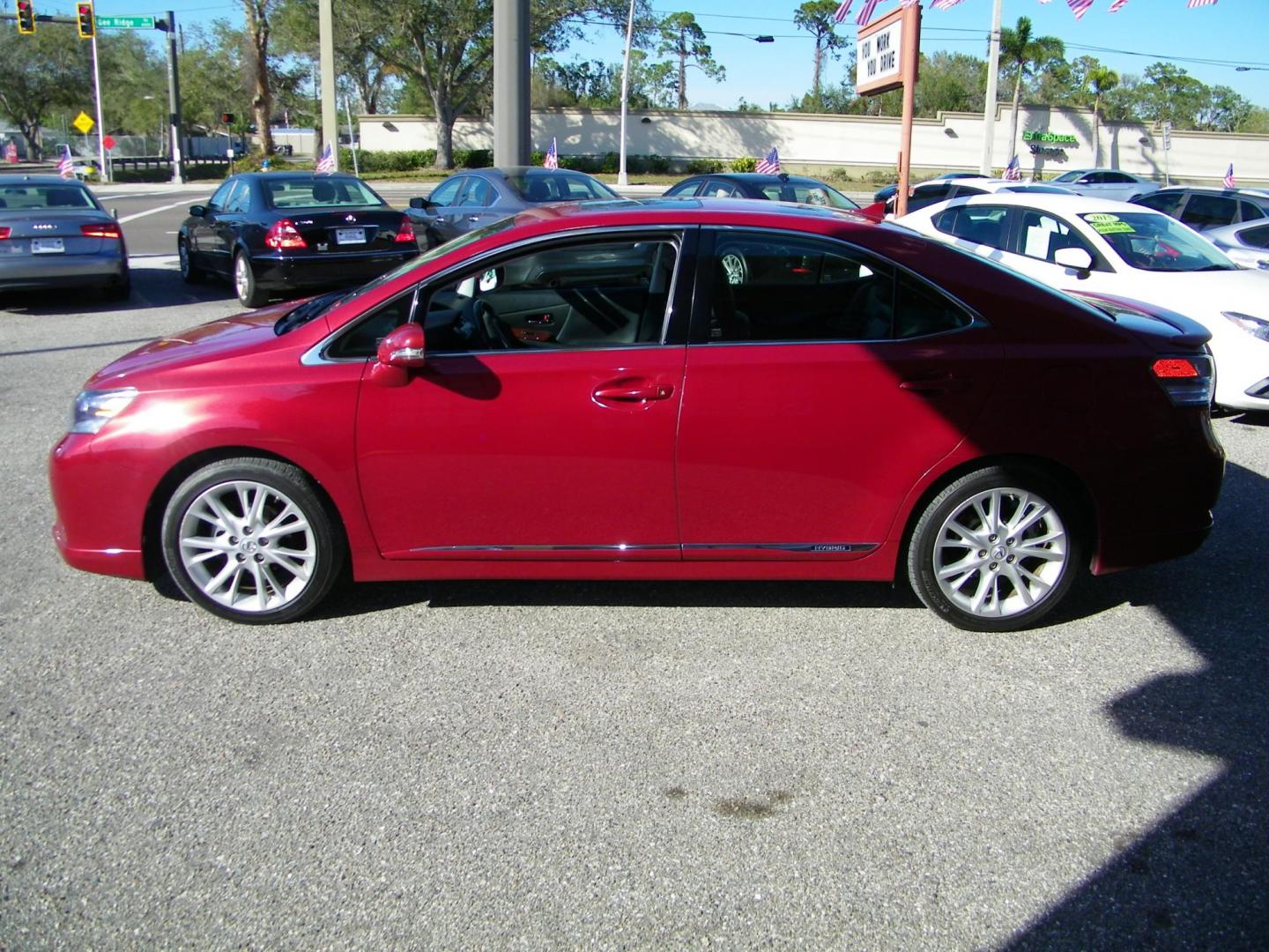 2010 Red /Black Lexus HS 250h Premium (JTHBB1BA8A2) with an 2.4L L4 DOHC 16V HYBRID engine, Automatic transmission, located at 4000 Bee Ridge Road, Sarasota, FL, 34233, (941) 926-0300, 27.298664, -82.489151 - Photo#1