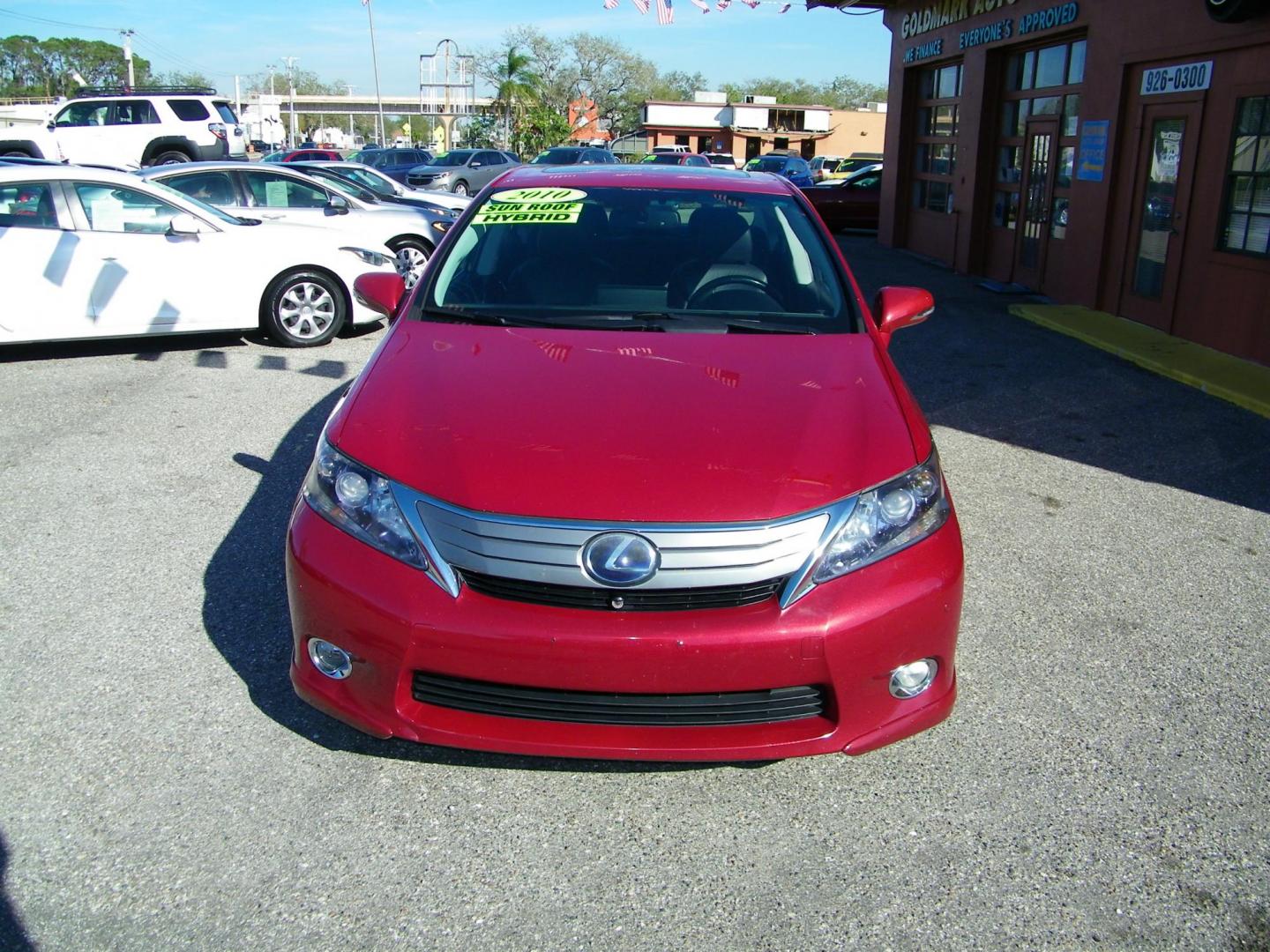 2010 Red /Black Lexus HS 250h Premium (JTHBB1BA8A2) with an 2.4L L4 DOHC 16V HYBRID engine, Automatic transmission, located at 4000 Bee Ridge Road, Sarasota, FL, 34233, (941) 926-0300, 27.298664, -82.489151 - Photo#2