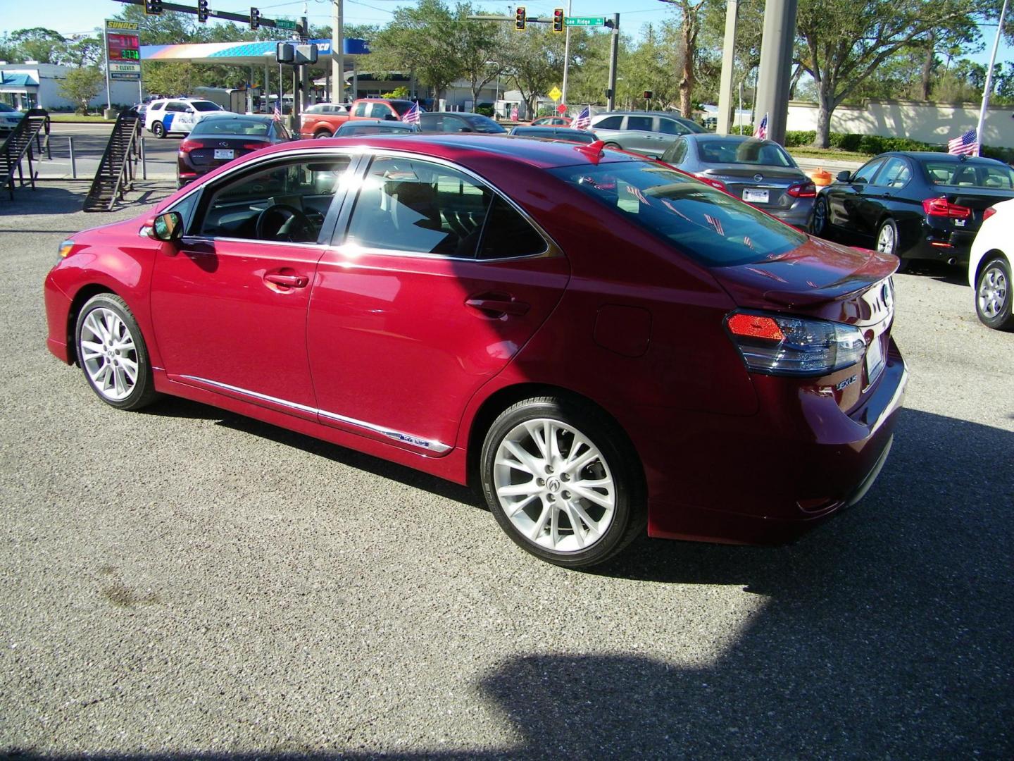 2010 Red /Black Lexus HS 250h Premium (JTHBB1BA8A2) with an 2.4L L4 DOHC 16V HYBRID engine, Automatic transmission, located at 4000 Bee Ridge Road, Sarasota, FL, 34233, (941) 926-0300, 27.298664, -82.489151 - Photo#3
