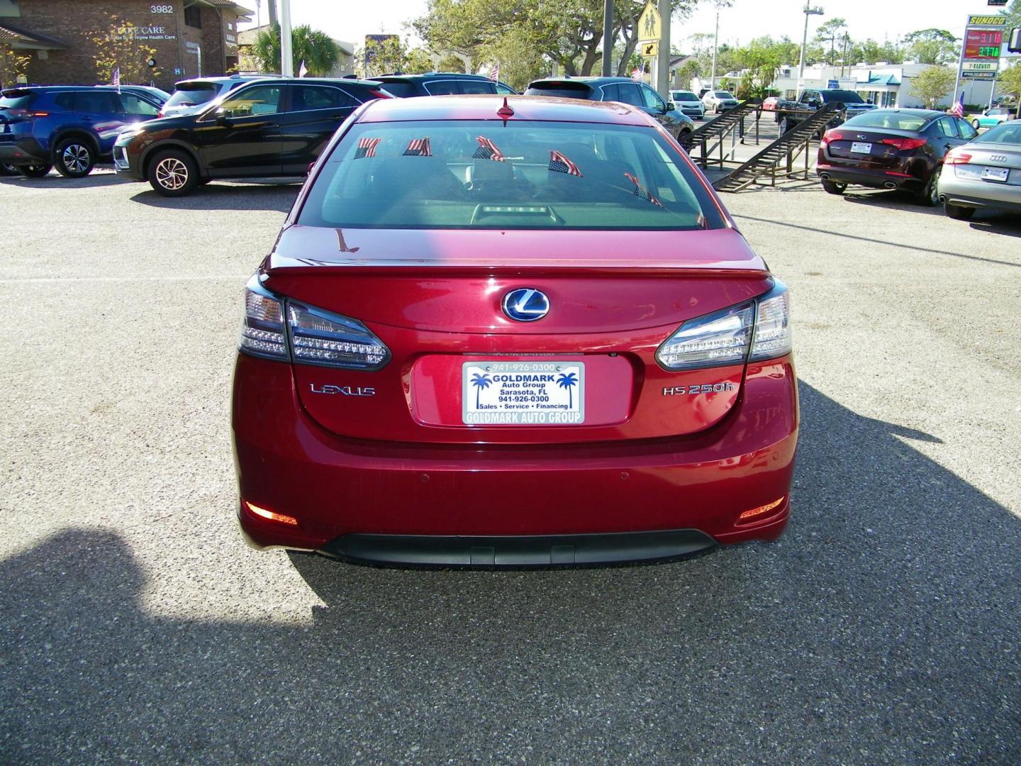 2010 Red /Black Lexus HS 250h Premium (JTHBB1BA8A2) with an 2.4L L4 DOHC 16V HYBRID engine, Automatic transmission, located at 4000 Bee Ridge Road, Sarasota, FL, 34233, (941) 926-0300, 27.298664, -82.489151 - Photo#4