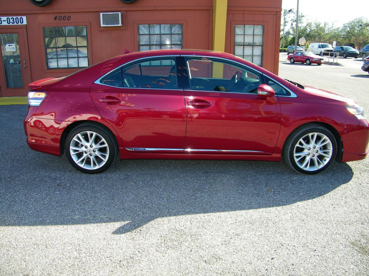 2010 Red /Black Lexus HS 250h Premium (JTHBB1BA8A2) with an 2.4L L4 DOHC 16V HYBRID engine, Automatic transmission, located at 4000 Bee Ridge Road, Sarasota, FL, 34233, (941) 926-0300, 27.298664, -82.489151 - Photo#5