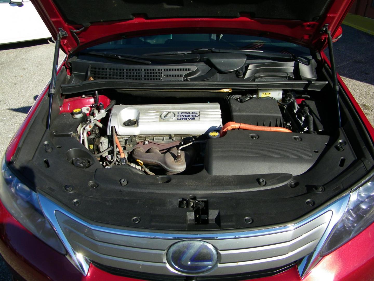 2010 Red /Black Lexus HS 250h Premium (JTHBB1BA8A2) with an 2.4L L4 DOHC 16V HYBRID engine, Automatic transmission, located at 4000 Bee Ridge Road, Sarasota, FL, 34233, (941) 926-0300, 27.298664, -82.489151 - Photo#9