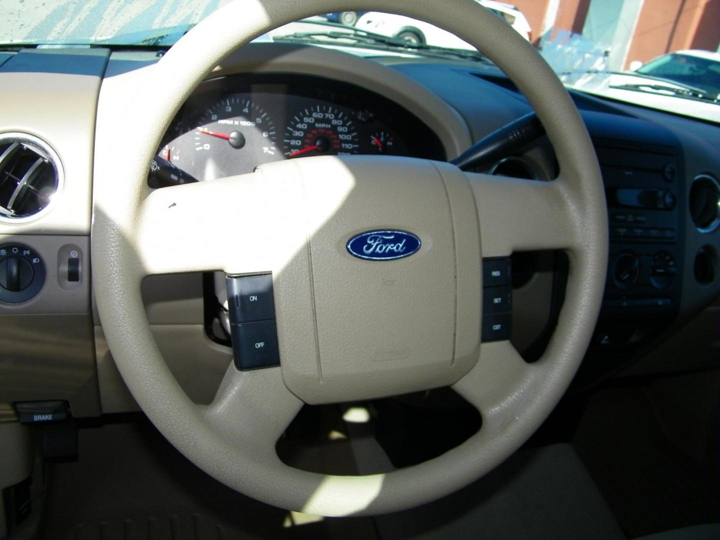 2007 White /Beige Ford F-150 STX 2WD (1FTRF12207N) with an 4.2L V6 OHV 12V engine, Automatic transmission, located at 4000 Bee Ridge Road, Sarasota, FL, 34233, (941) 926-0300, 27.298664, -82.489151 - Photo#17