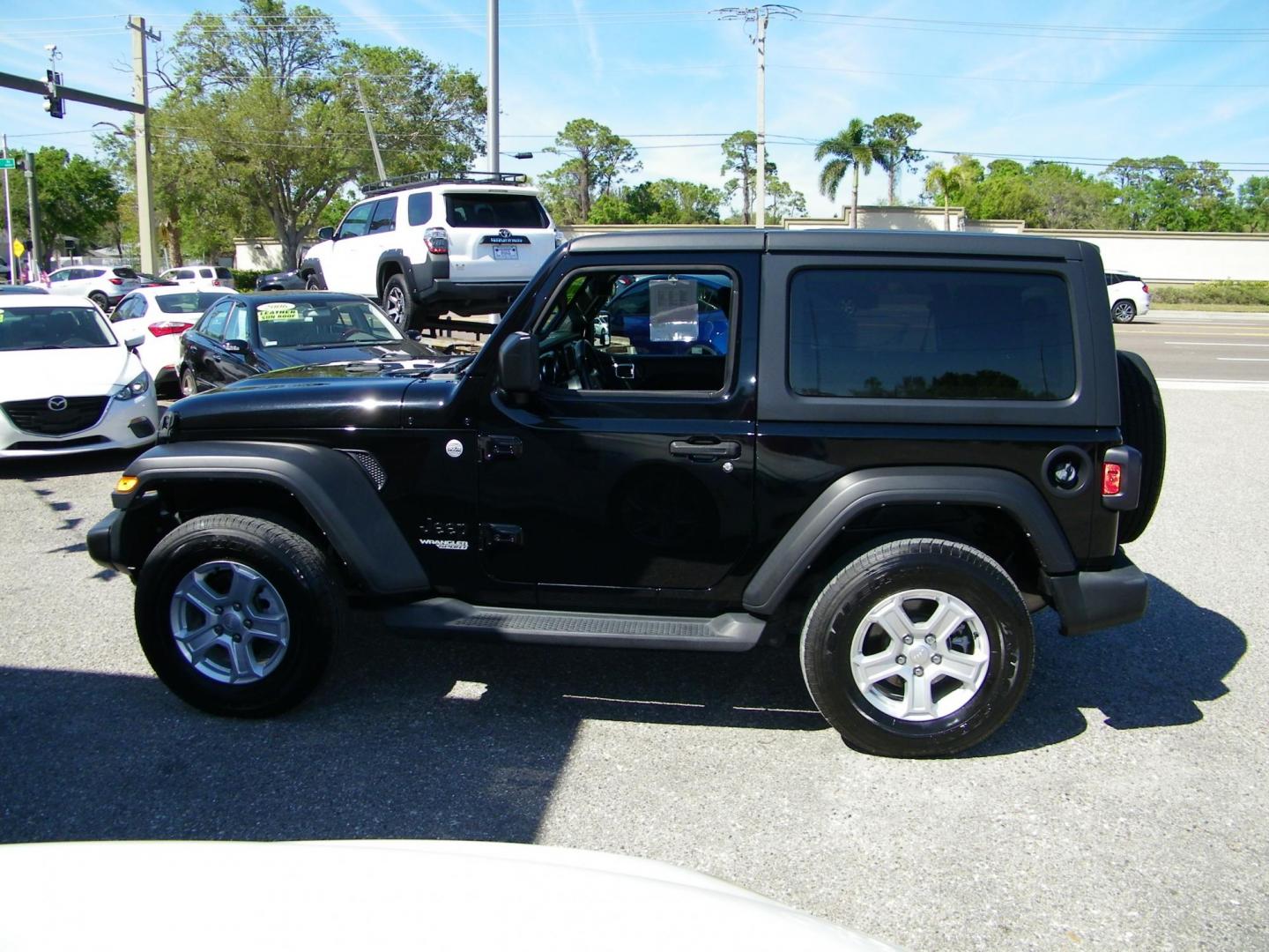 2021 Black /Black Jeep Wrangler Sport (1C4GJXAN2MW) with an 2.0L L4 DOHC 16V TURBO engine, Automatic transmission, located at 4000 Bee Ridge Road, Sarasota, FL, 34233, (941) 926-0300, 27.298664, -82.489151 - Photo#4