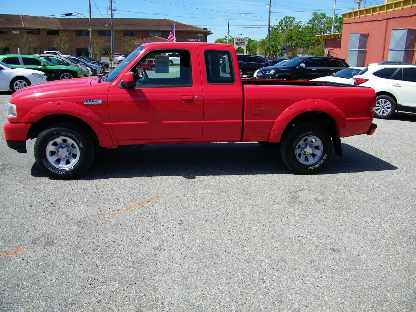 2006 Red /Gray Ford Ranger Sport SuperCab 2WD (1FTYR14U96P) with an 3.0L V6 OHV 12V engine, Automatic transmission, located at 4000 Bee Ridge Road, Sarasota, FL, 34233, (941) 926-0300, 27.298664, -82.489151 - Photo#2