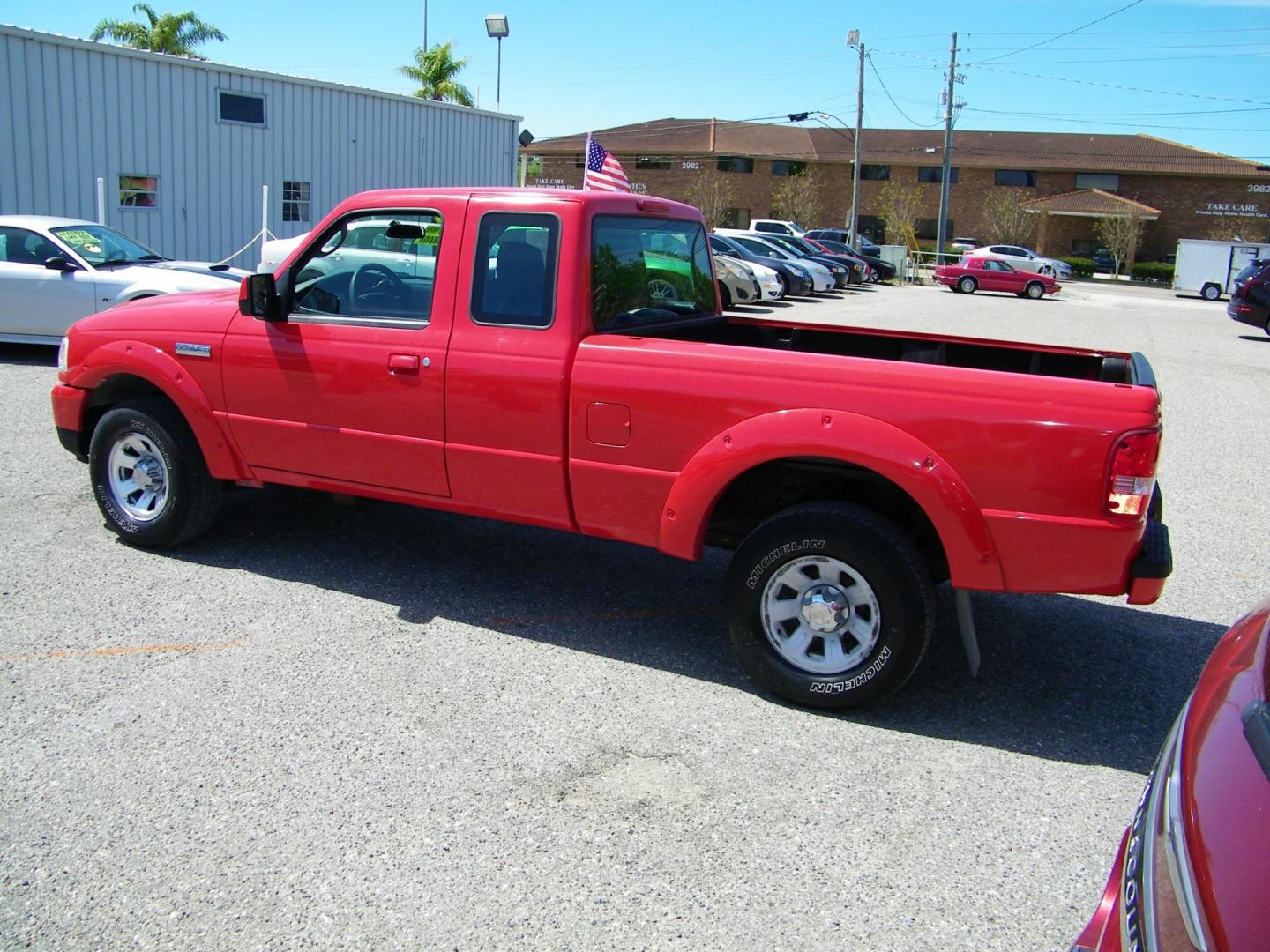 2006 Red /Gray Ford Ranger Sport SuperCab 2WD (1FTYR14U96P) with an 3.0L V6 OHV 12V engine, Automatic transmission, located at 4000 Bee Ridge Road, Sarasota, FL, 34233, (941) 926-0300, 27.298664, -82.489151 - Photo#3