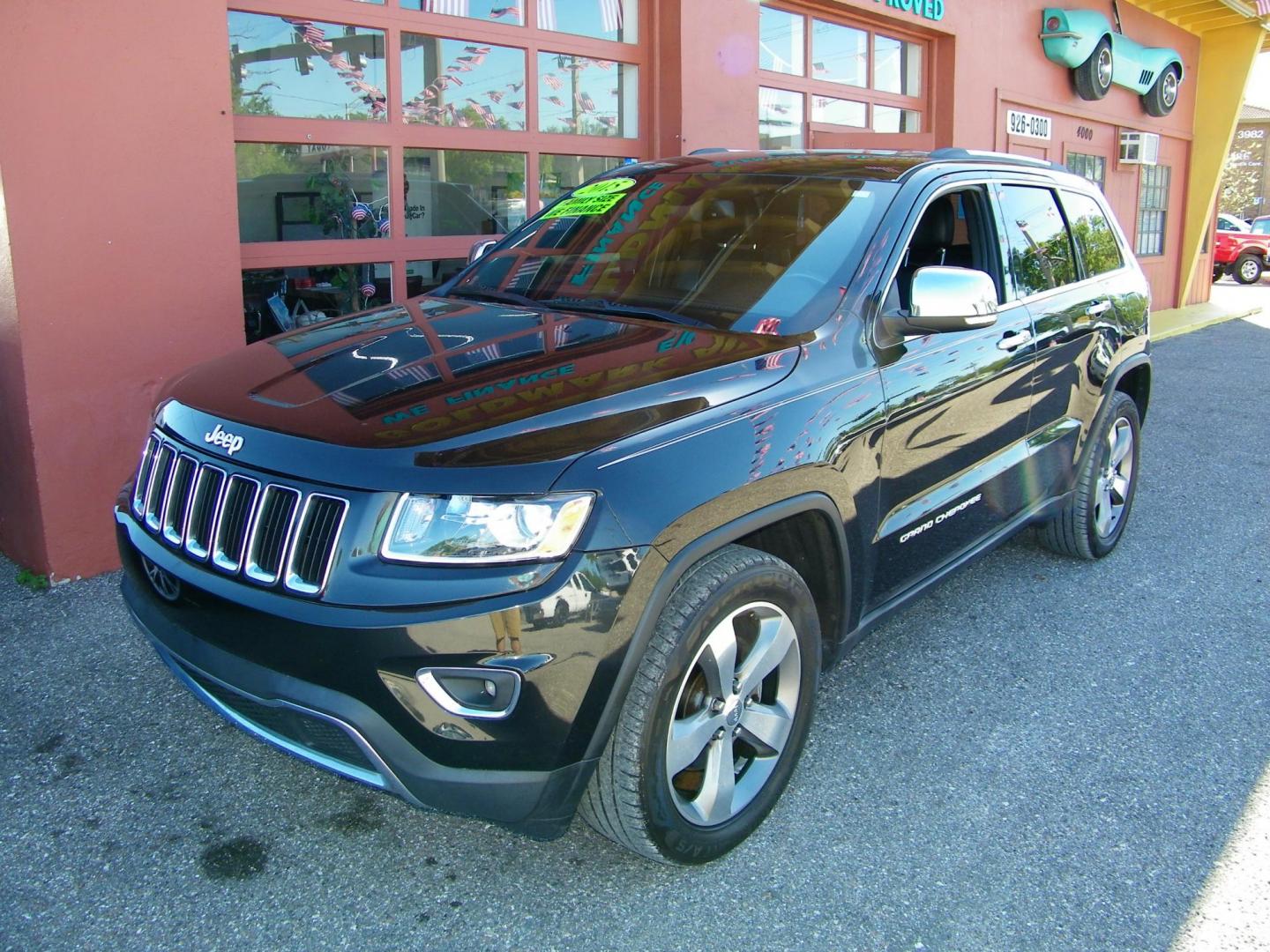 2015 Black /Black Jeep Grand Cherokee Limited 2WD (1C4RJEBG9FC) with an 3.6L V6 DOHC 24V engine, 8-Speed Automatic transmission, located at 4000 Bee Ridge Road, Sarasota, FL, 34233, (941) 926-0300, 27.298664, -82.489151 - Photo#1