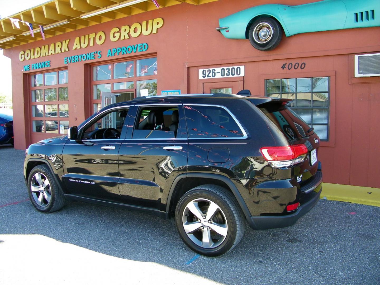 2015 Black /Black Jeep Grand Cherokee Limited 2WD (1C4RJEBG9FC) with an 3.6L V6 DOHC 24V engine, 8-Speed Automatic transmission, located at 4000 Bee Ridge Road, Sarasota, FL, 34233, (941) 926-0300, 27.298664, -82.489151 - Photo#3