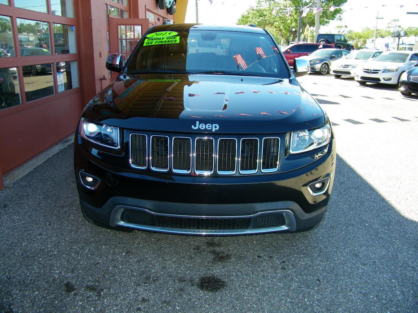 2015 Black /Black Jeep Grand Cherokee Limited 2WD (1C4RJEBG9FC) with an 3.6L V6 DOHC 24V engine, 8-Speed Automatic transmission, located at 4000 Bee Ridge Road, Sarasota, FL, 34233, (941) 926-0300, 27.298664, -82.489151 - Photo#2