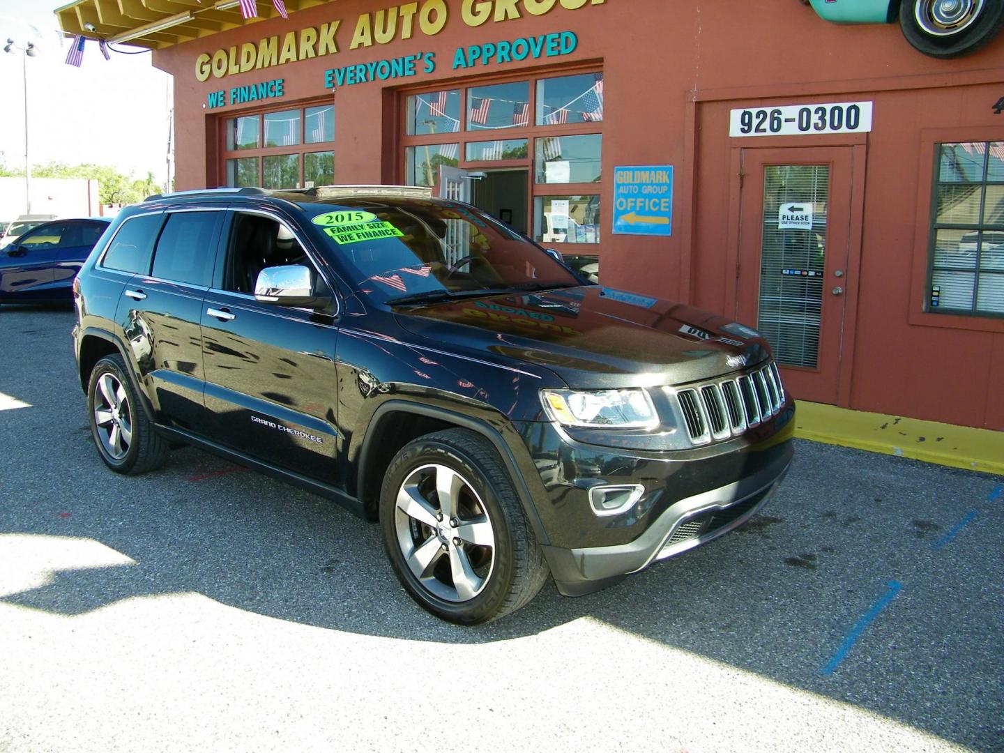 2015 Black /Black Jeep Grand Cherokee Limited 2WD (1C4RJEBG9FC) with an 3.6L V6 DOHC 24V engine, 8-Speed Automatic transmission, located at 4000 Bee Ridge Road, Sarasota, FL, 34233, (941) 926-0300, 27.298664, -82.489151 - Photo#5