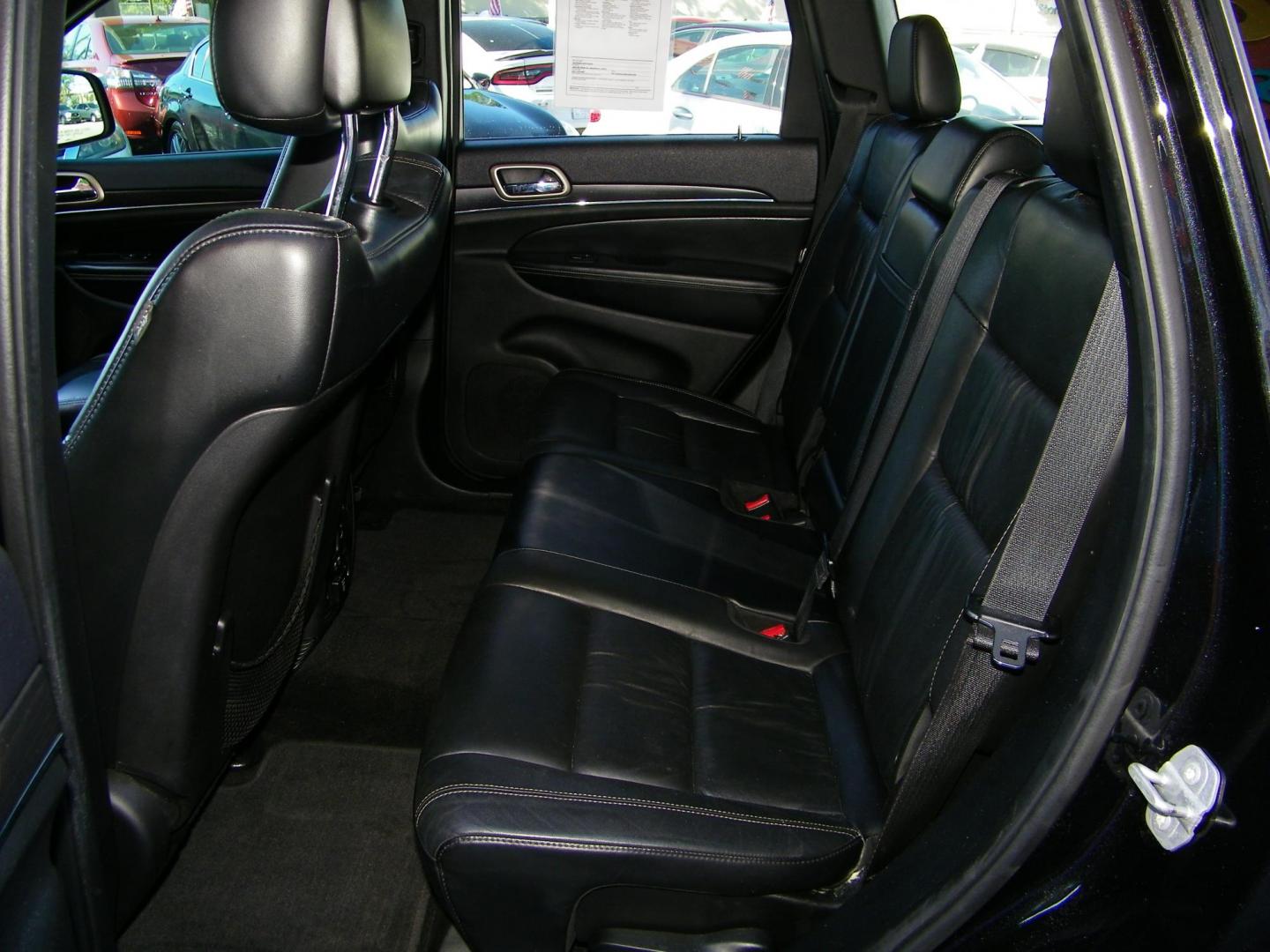 2015 Black /Black Jeep Grand Cherokee Limited 2WD (1C4RJEBG9FC) with an 3.6L V6 DOHC 24V engine, 8-Speed Automatic transmission, located at 4000 Bee Ridge Road, Sarasota, FL, 34233, (941) 926-0300, 27.298664, -82.489151 - Photo#9