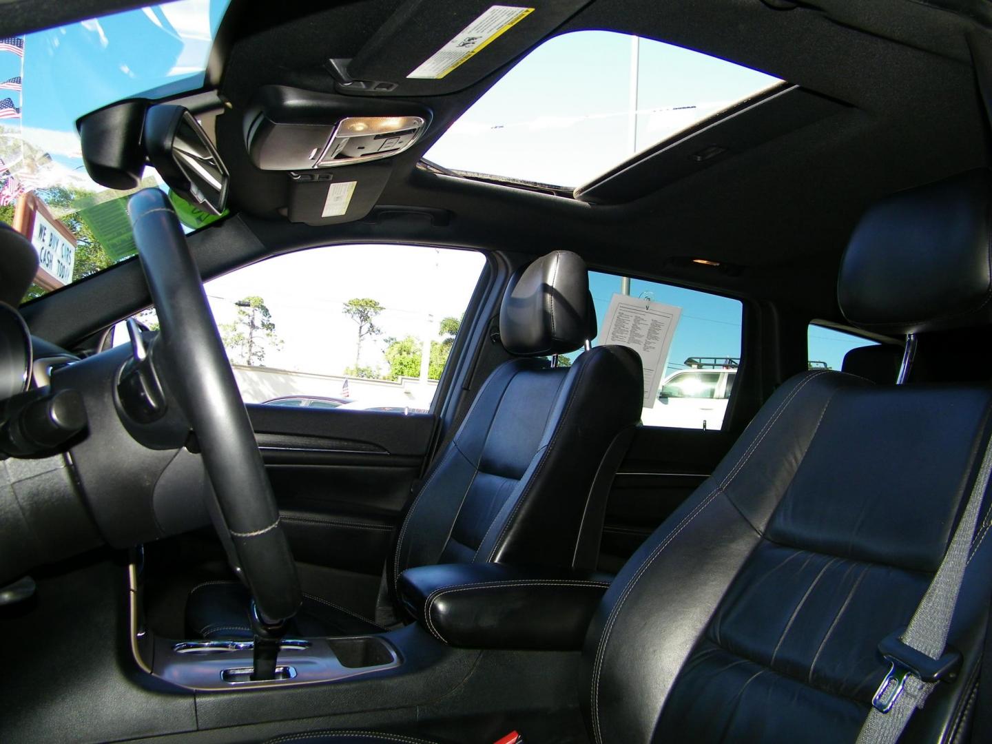 2015 Black /Black Jeep Grand Cherokee Limited 2WD (1C4RJEBG9FC) with an 3.6L V6 DOHC 24V engine, 8-Speed Automatic transmission, located at 4000 Bee Ridge Road, Sarasota, FL, 34233, (941) 926-0300, 27.298664, -82.489151 - Photo#7