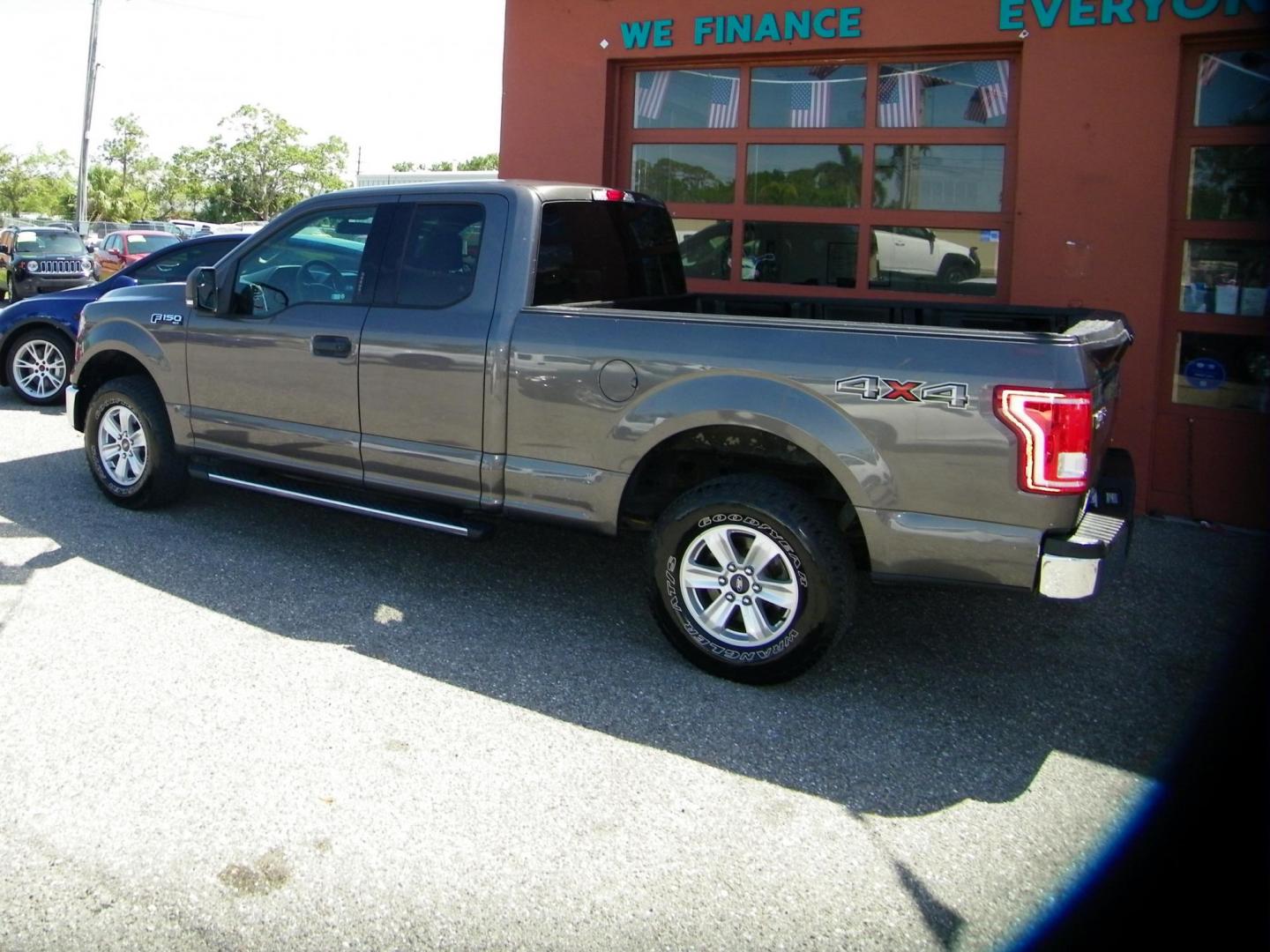 2015 Gray /Gray Ford F-150 Lariat SuperCab 6.5-ft. Bed 4WD (1FTEX1E89FK) with an 3.5L V6 DOHC 24V engine, 6-Speed Automatic transmission, located at 4000 Bee Ridge Road, Sarasota, FL, 34233, (941) 926-0300, 27.298664, -82.489151 - Photo#2